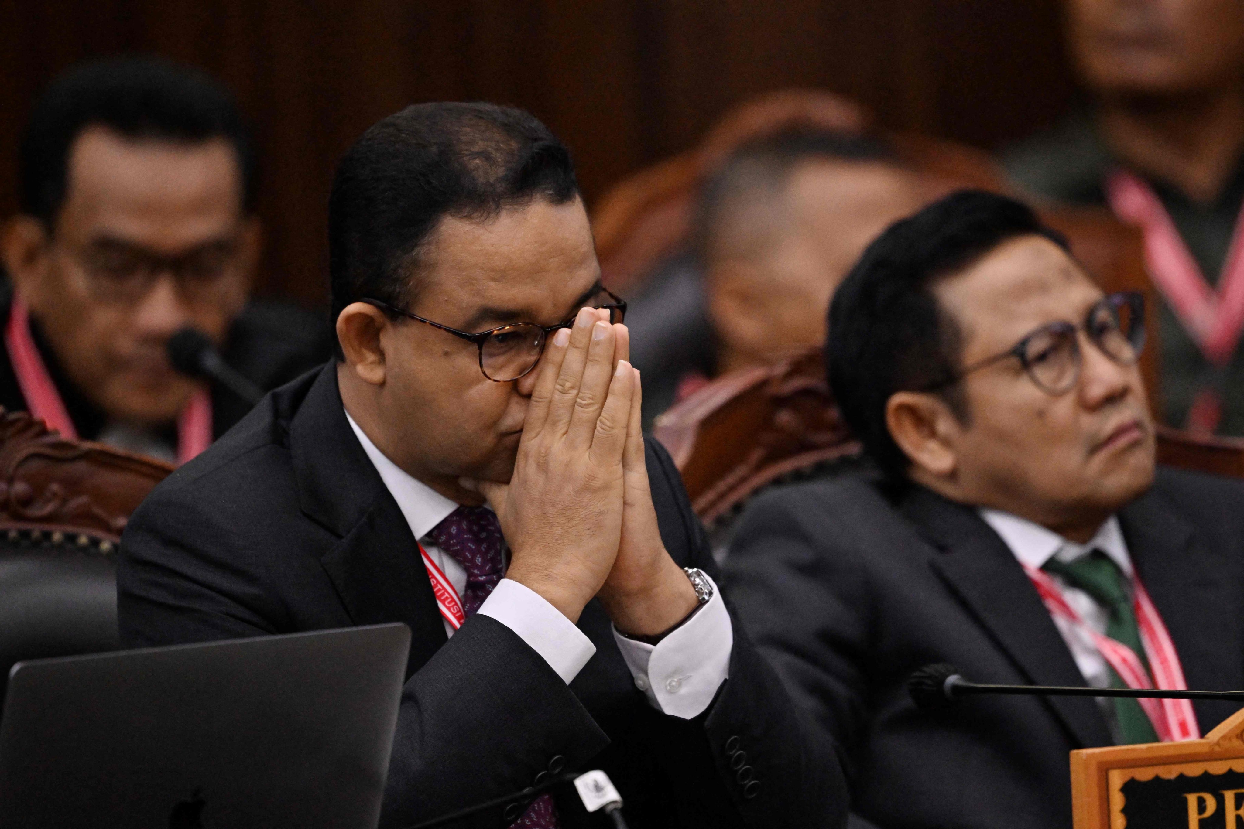 Presidential election challengers Anies Baswedan (L) and Muhaimin Iskandar (R) attend a hearing at the Constitutional Court in Jakarta on April 22. Photo: AFP