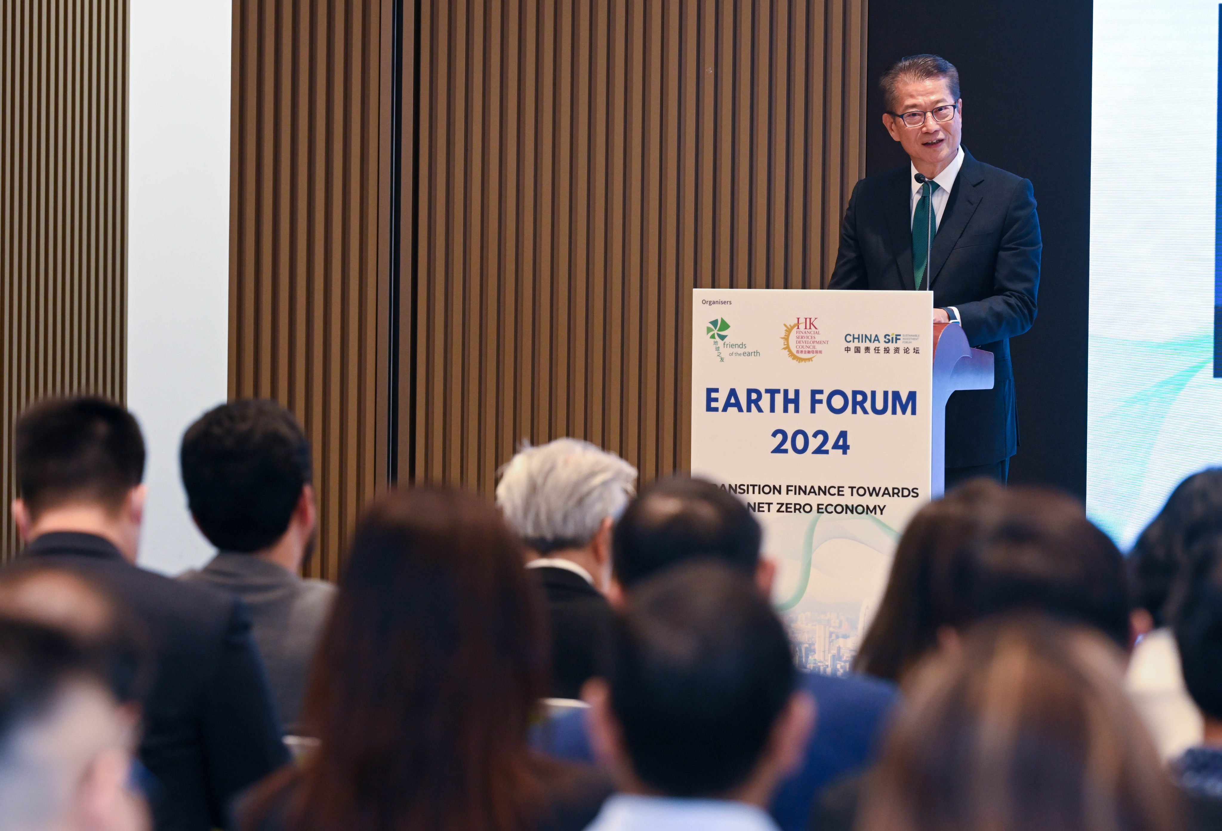 Financial Secretary Paul Chan speaks at Earth Forum 2024 in Hong Kong on Monday. Photo: Handout