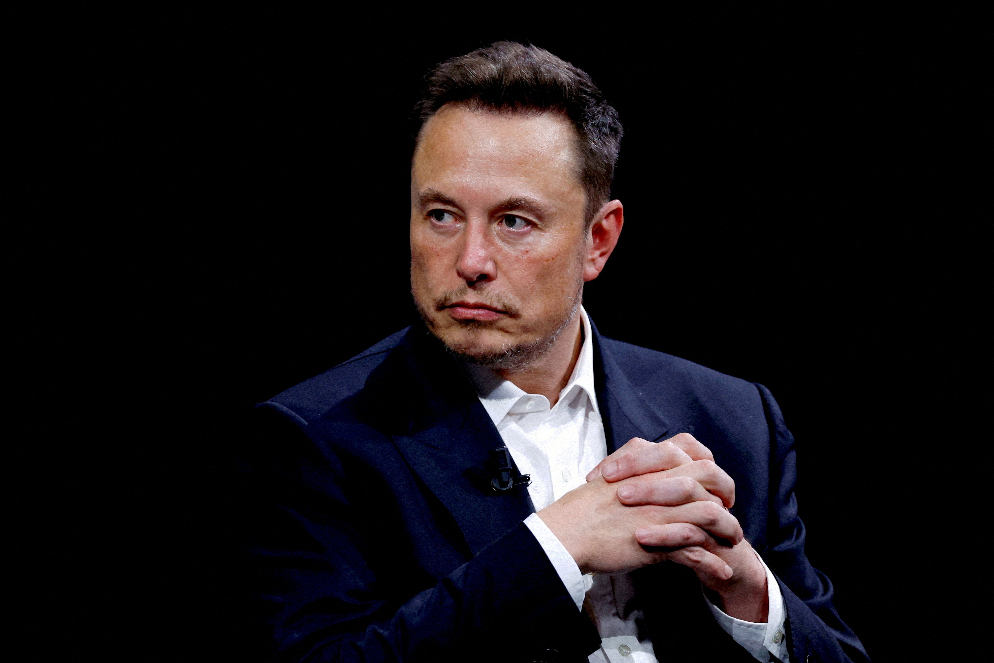 Elon Musk has ordered Tesla's biggest lay-offs ever and staked its future on a next-generation, self-driving vehicle concept called the robotaxi, unsettling many at the company. Photo: Reuters
