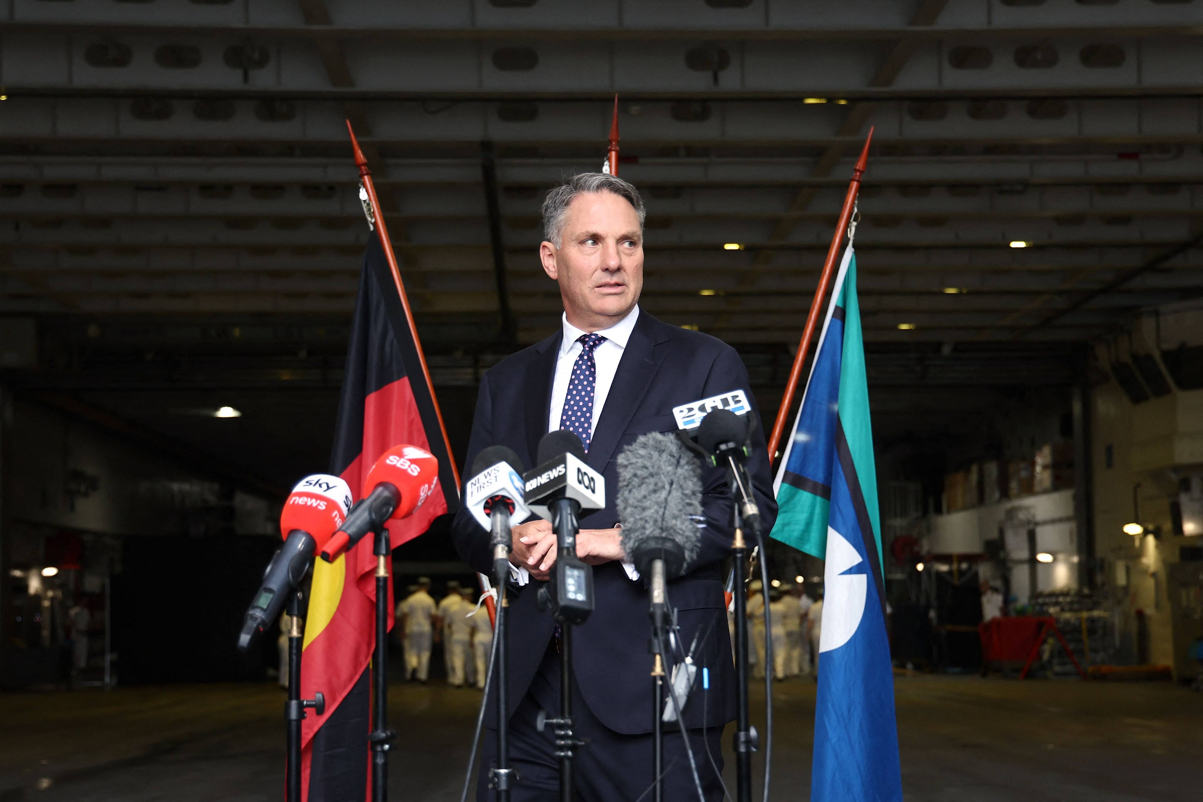 Australia’s Defence Minister Richard Marles prepares to speak aboard HMAS Canberra in Sydney on February 20. Photo: AFP 