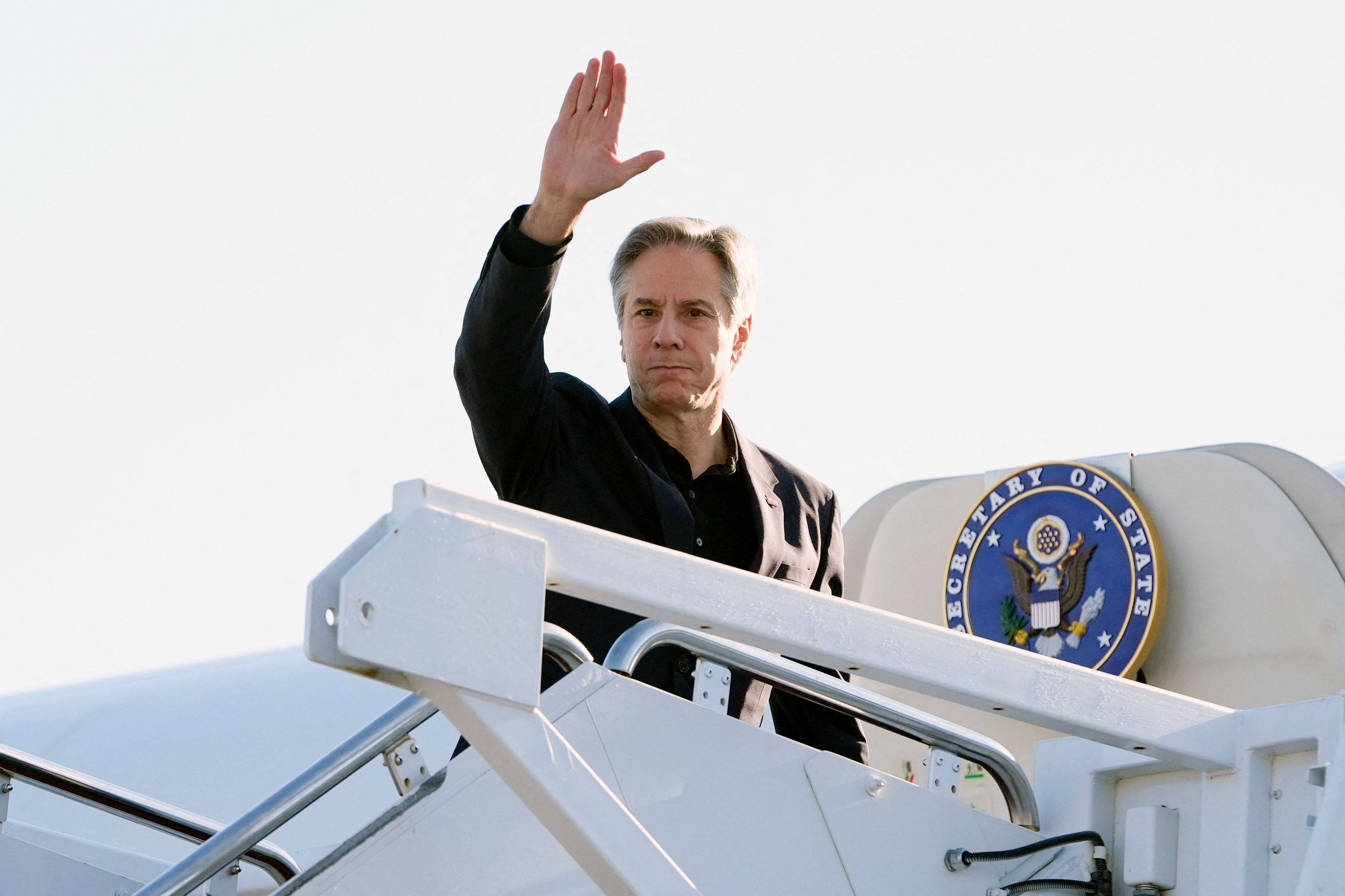 US Secretary of State Antony Blinken waves as he boards his plane at Joint Base Andrews in Maryland, on Tuesday, on his way to Beijing. Photo:  AFP