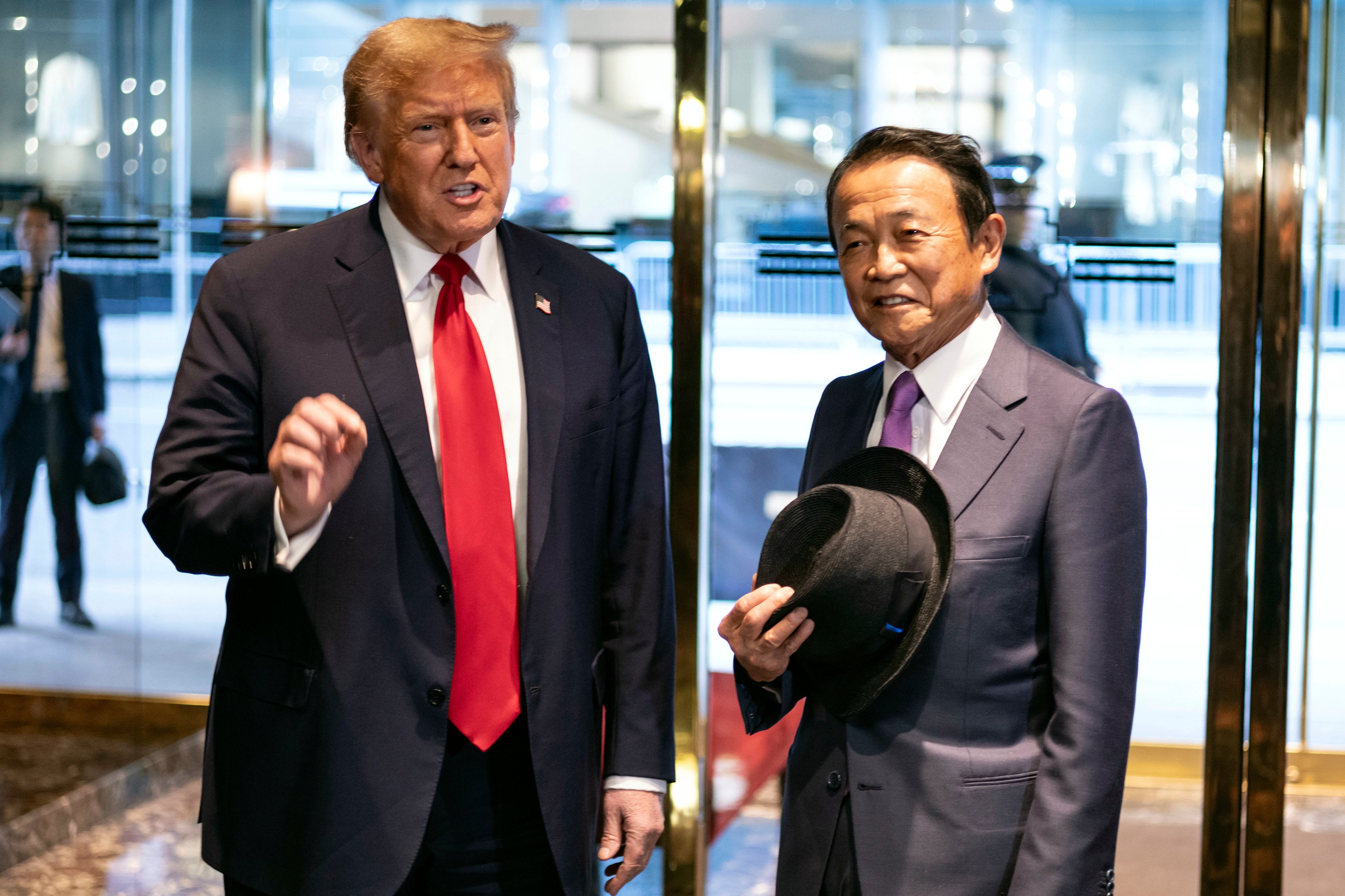 Donald Trump and former Japanese prime minister Taro Aso at Trump Tower in New York. Photo: AP