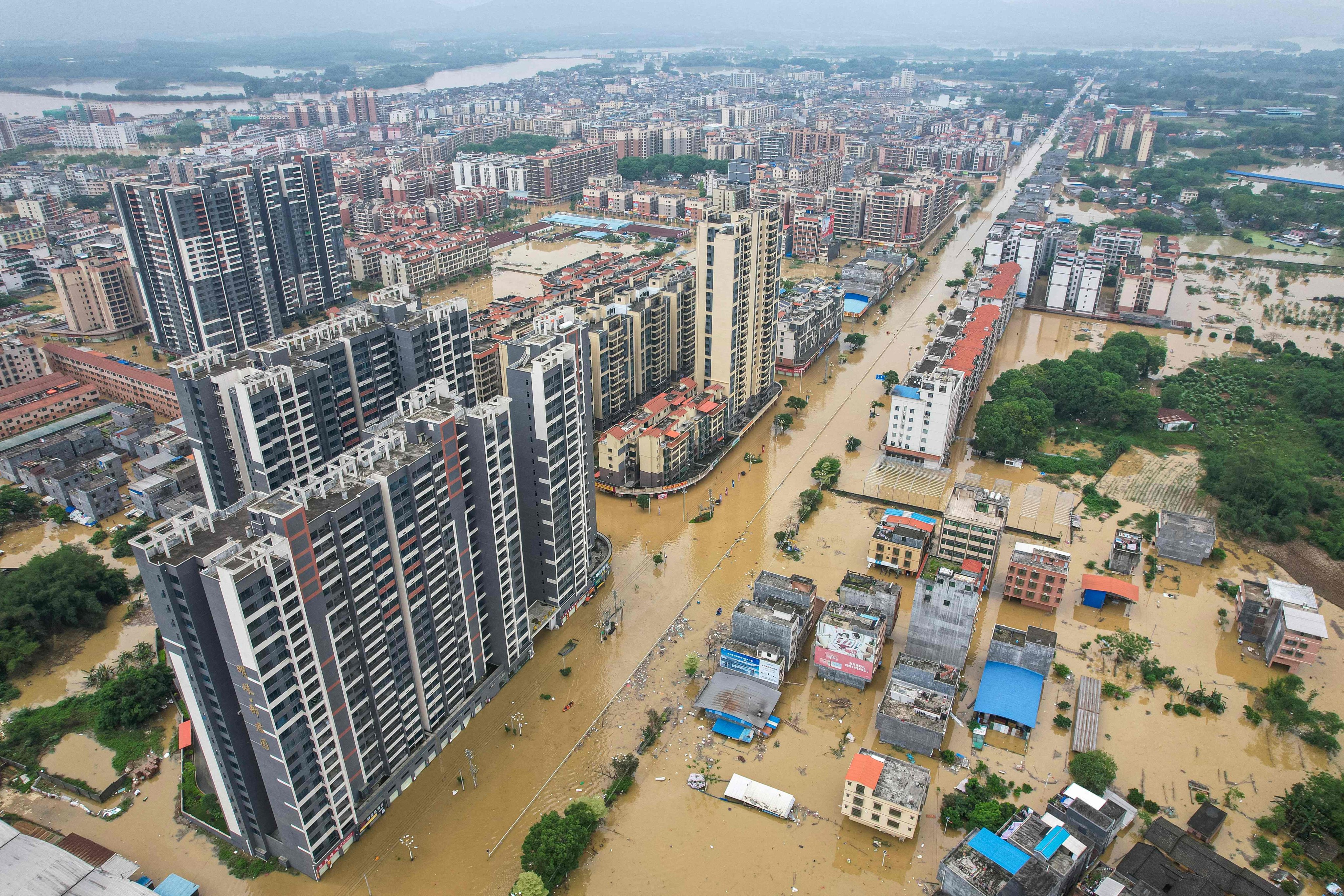Buildings and streets are flooded after heavy rains hit Qingyuan city, in China’s southern Guangdong province. Photo: AFP