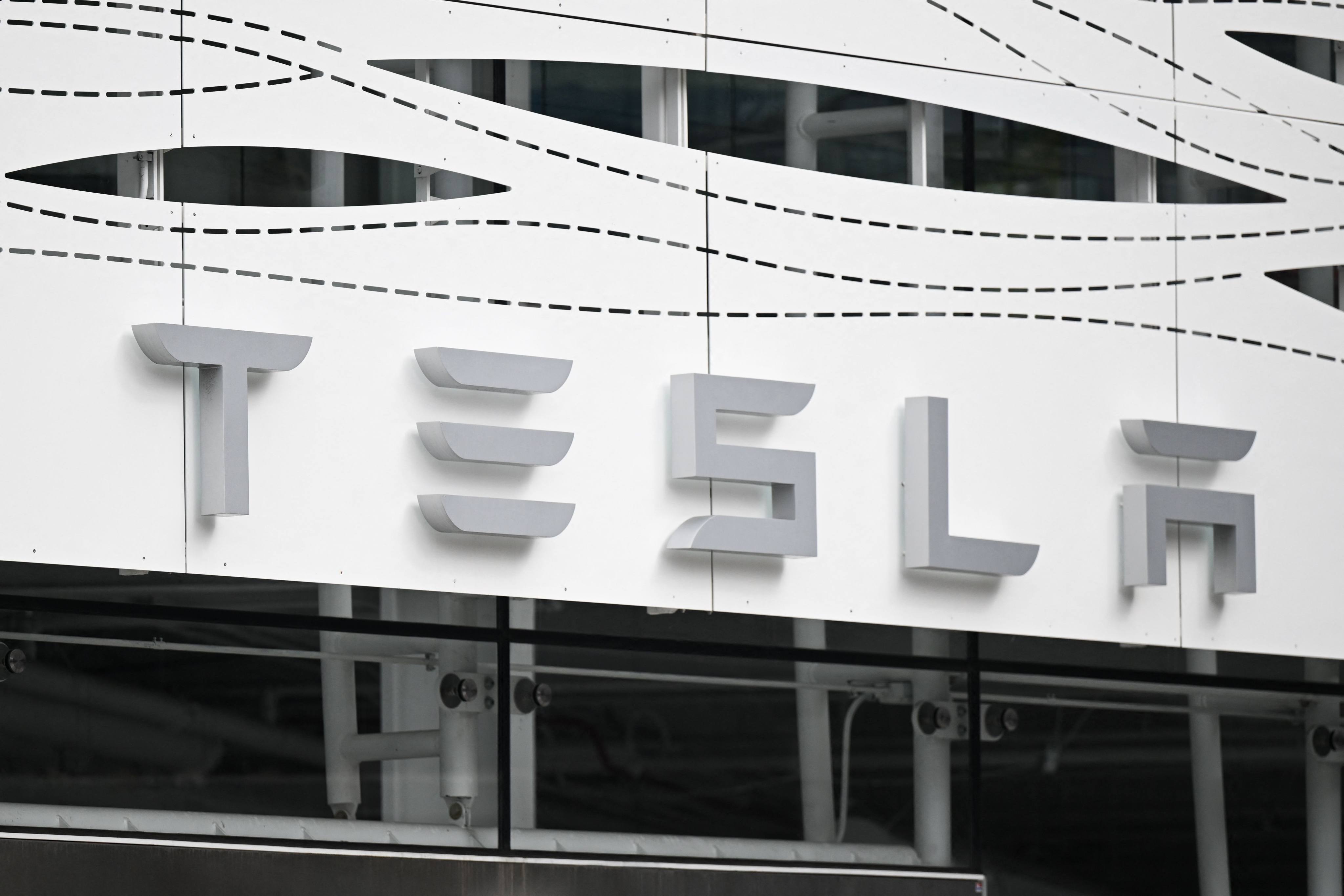 The Tesla logo is seen at the Santa Monica Place store in Santa Monica, California, on March 20, 2023. Photo: AFP