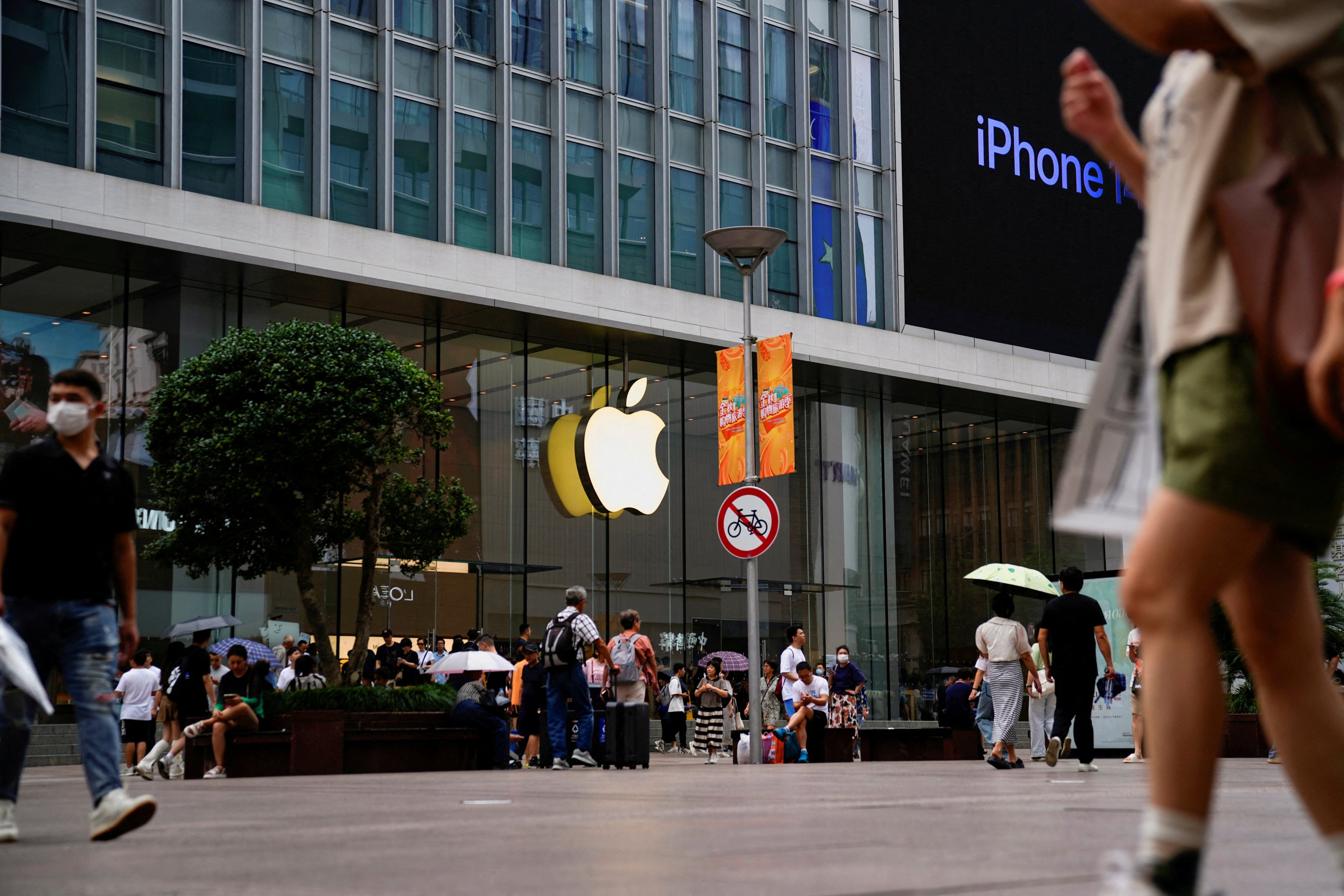 Outside an Apple store in Shanghai, China. Photo: Reuters