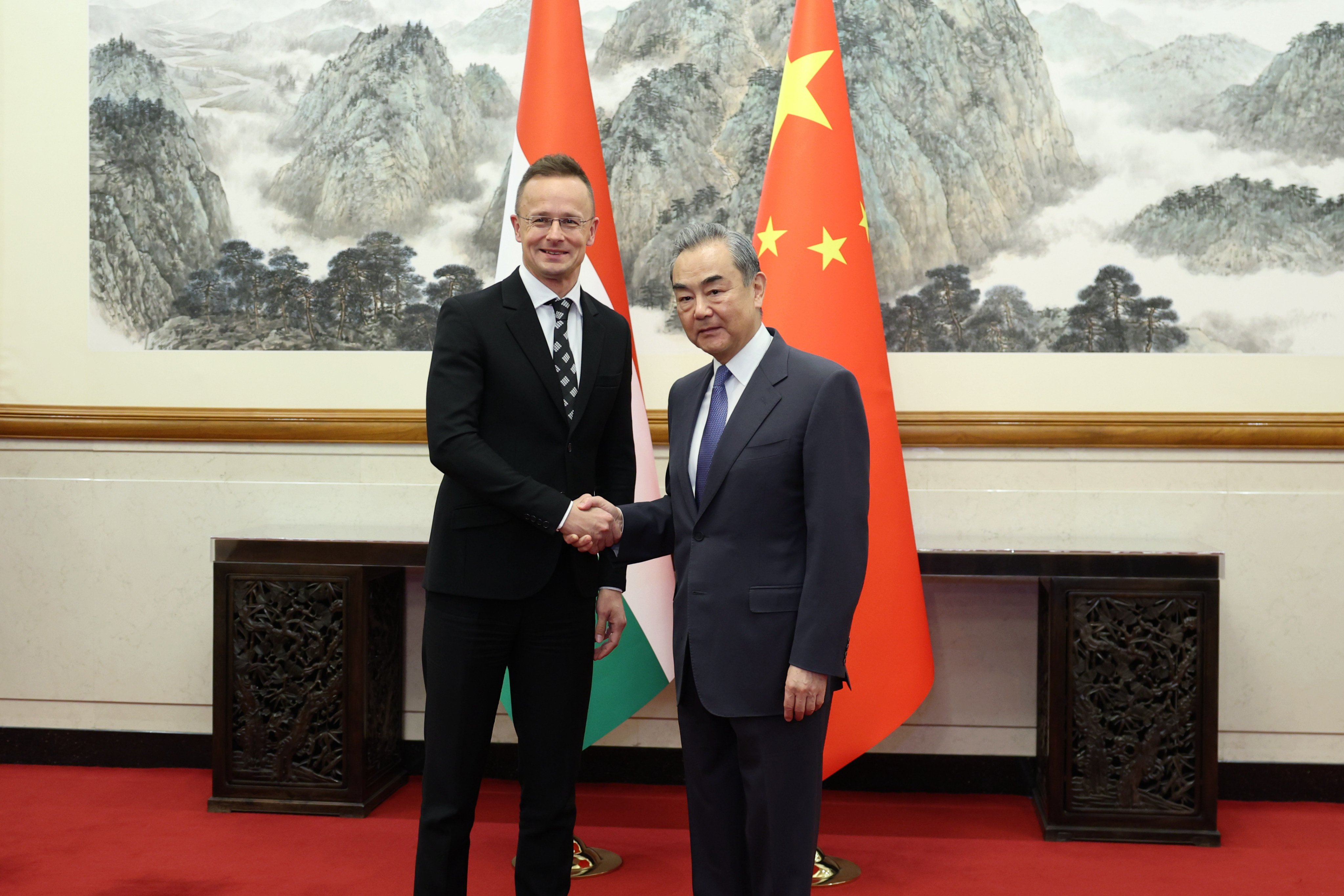 Chinese Foreign Minister Wang Yi, right, holds talks with Hungarian Foreign Minister Peter Szijjarto on Thursday. Wang said Beijing hoped Budapest would encourage the EU to take a “rational and friendly view of China’s development”. Photo: Xinhua