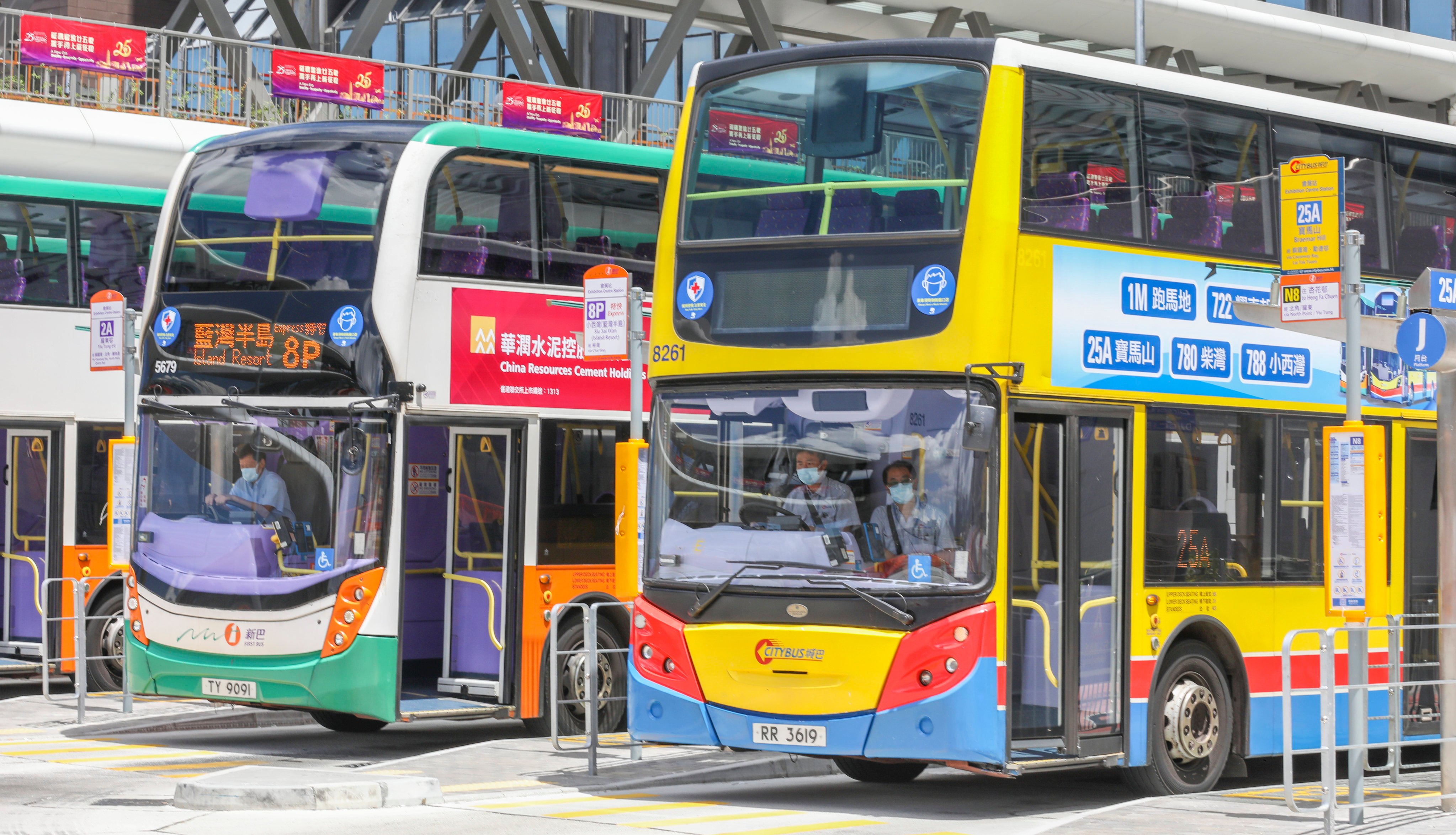 New World First Bus and Citybus vehicles park at the bus terminal in Wan Chai. The first batch of five mainland drivers for Citybus are due to arrive next month to take the local driving test. Photo: Yik Yeung-man