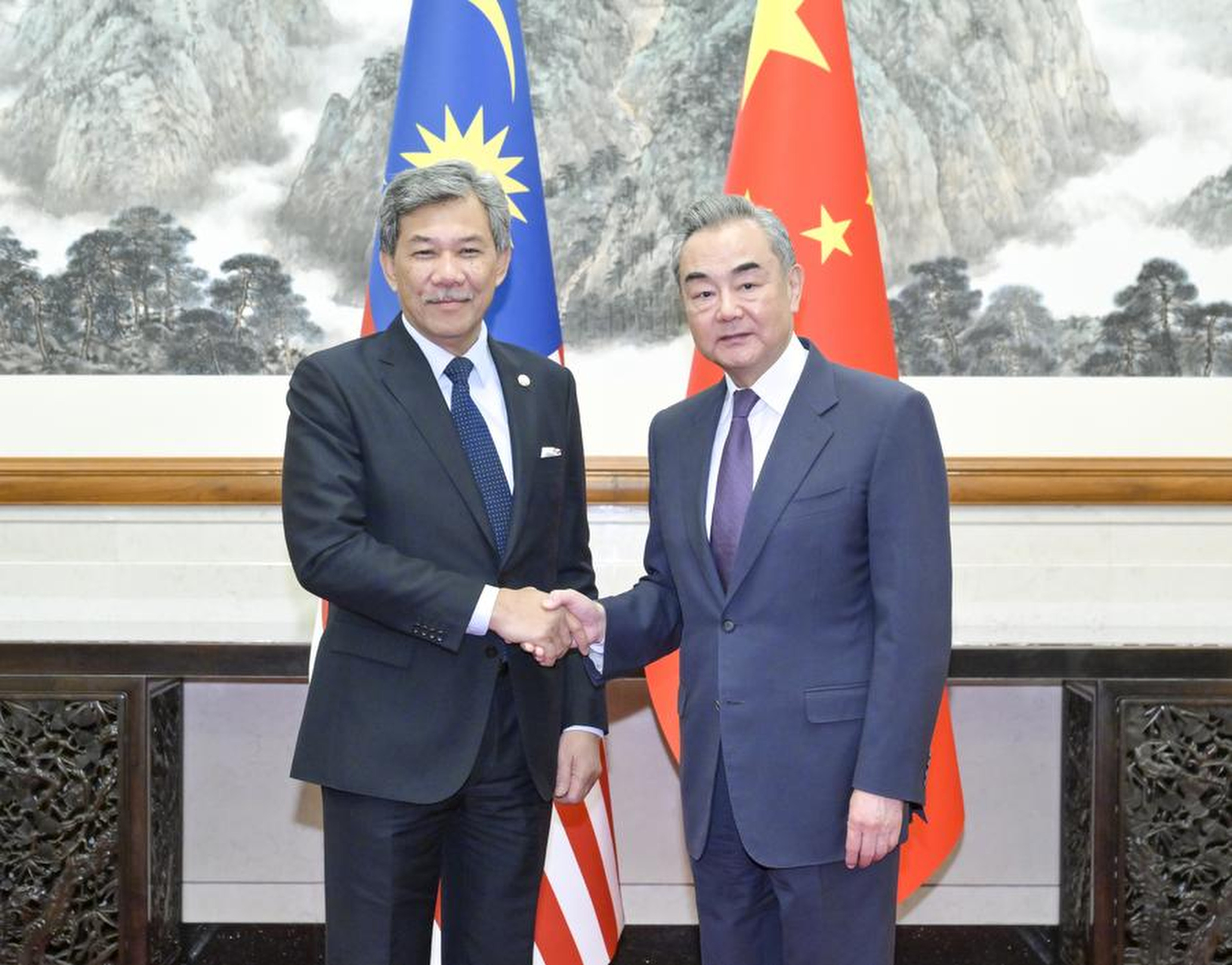 Visiting Malaysian Foreign Minister Mohamad Hasan largely echoed Beijing’s position on South China Sea issues, saying his country opposes ‘external forces’ in the region. Photo: Xinhua