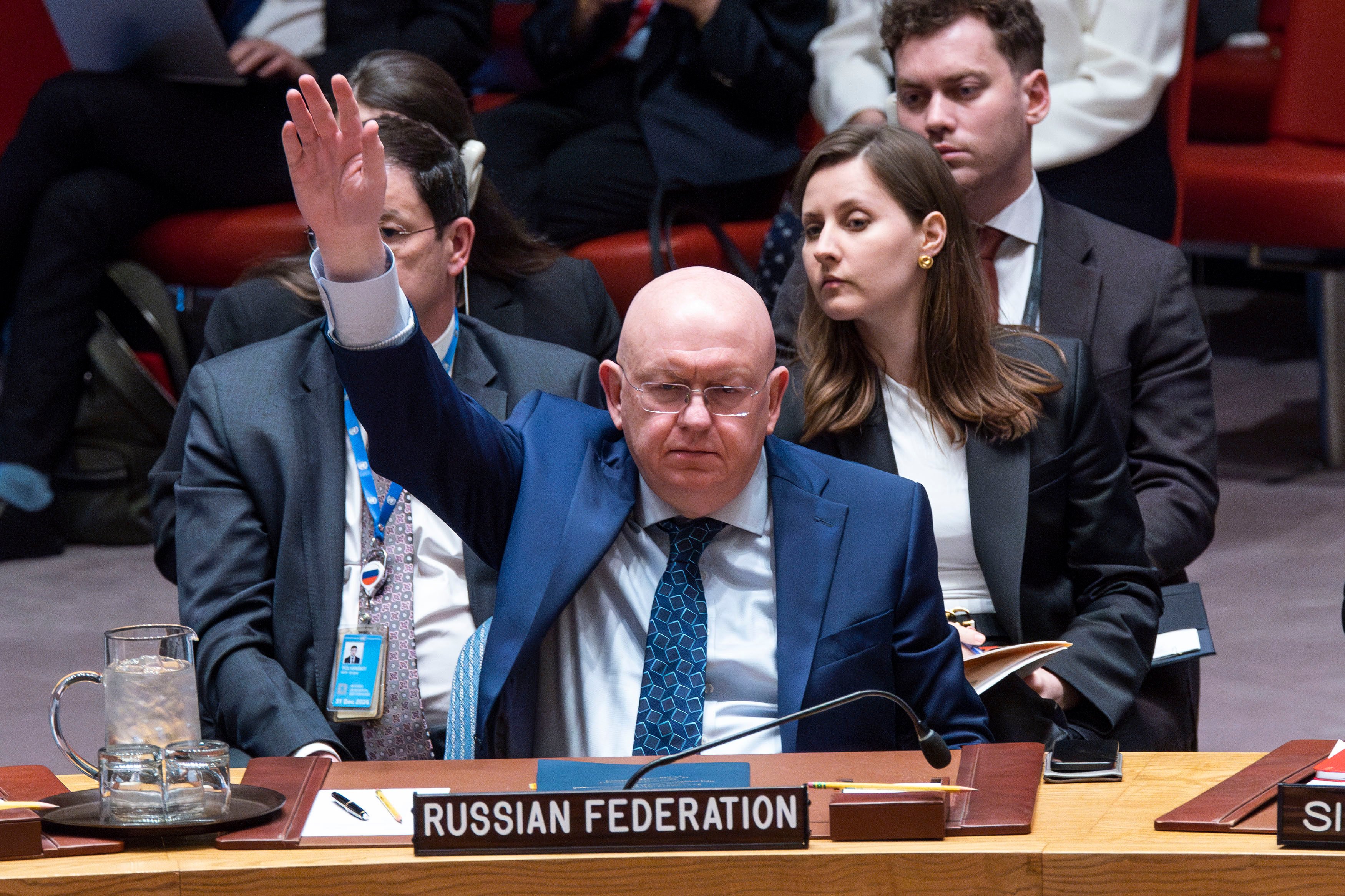 Russian Permanent Representative to the UN Vassily Nebenzia raises his hand to veto the non-proliferation of nuclear weapons resolution bill at the United Nations headquarters on Wednesday. Photo: AP