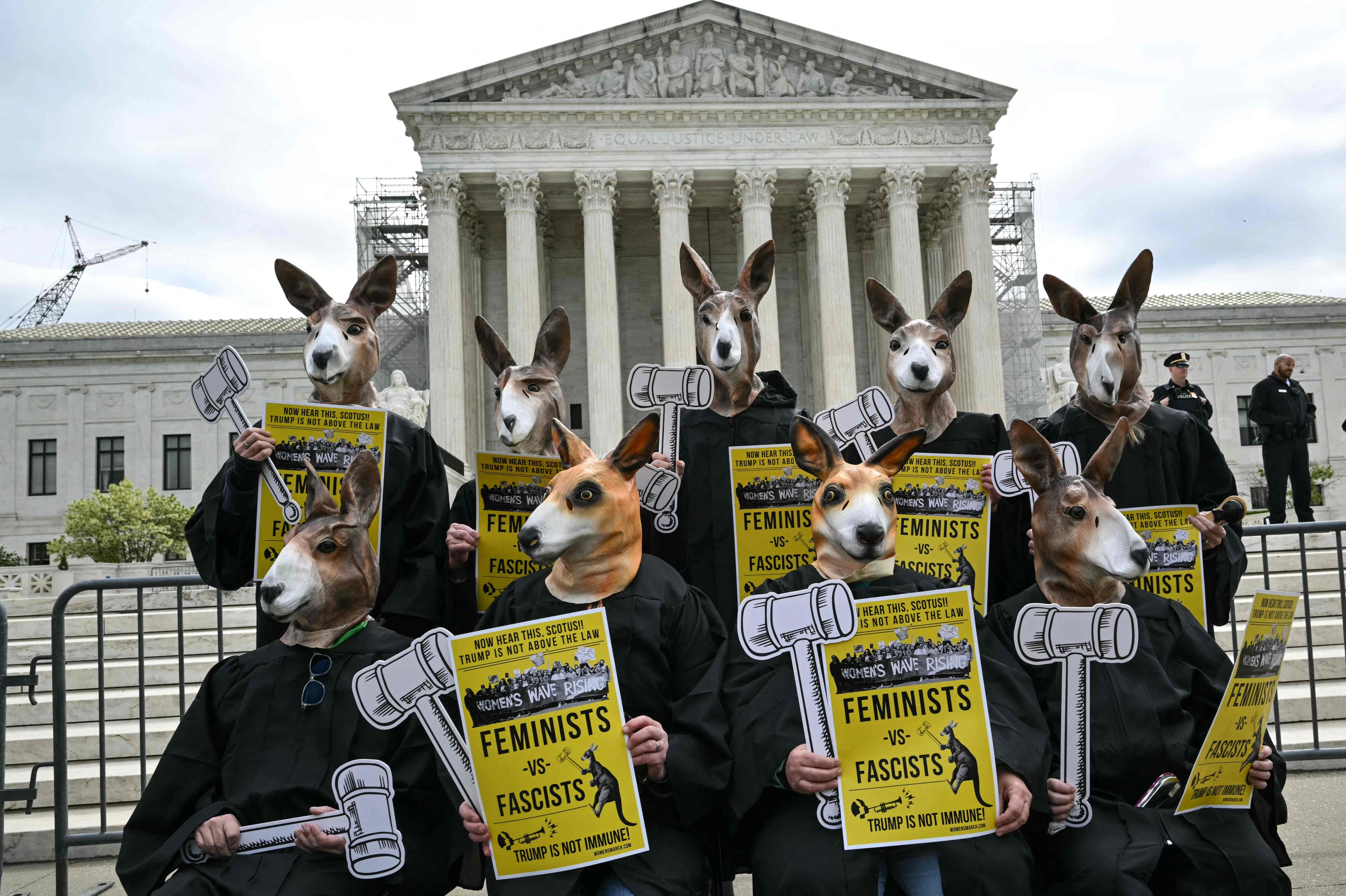 Activists portraying a kangaroo court demonstrate outside the Supreme Court. Photo: AFP