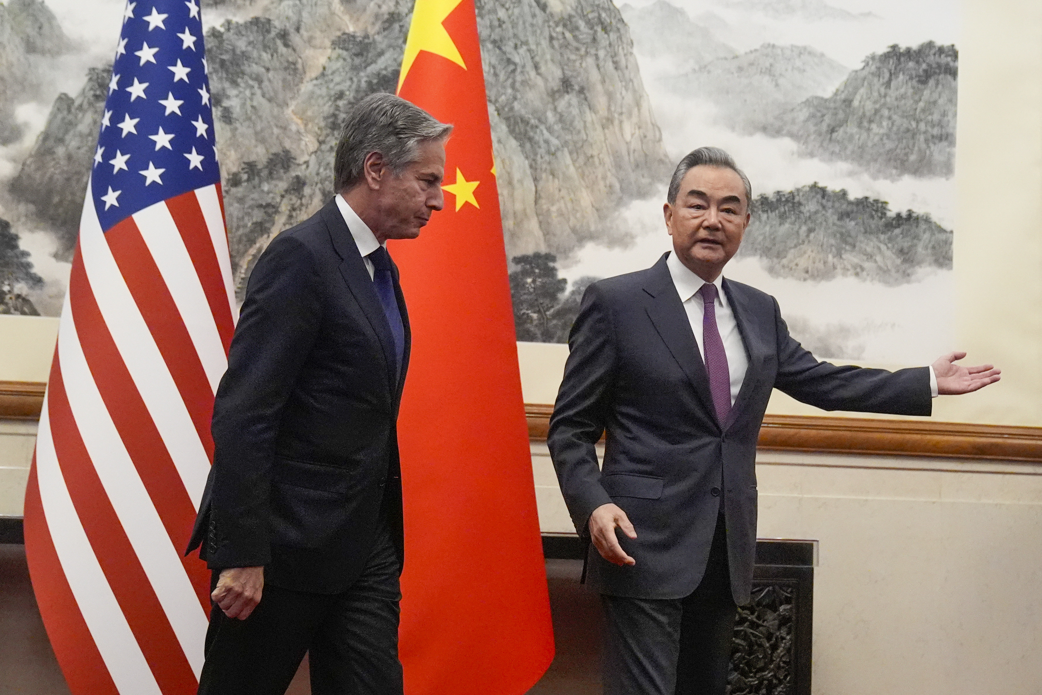 China’s Foreign Minister Wang Yi, right, gestures to US Secretary of State Antony Blinken at the Diaoyutai State Guesthouse on Friday. Photo: AP