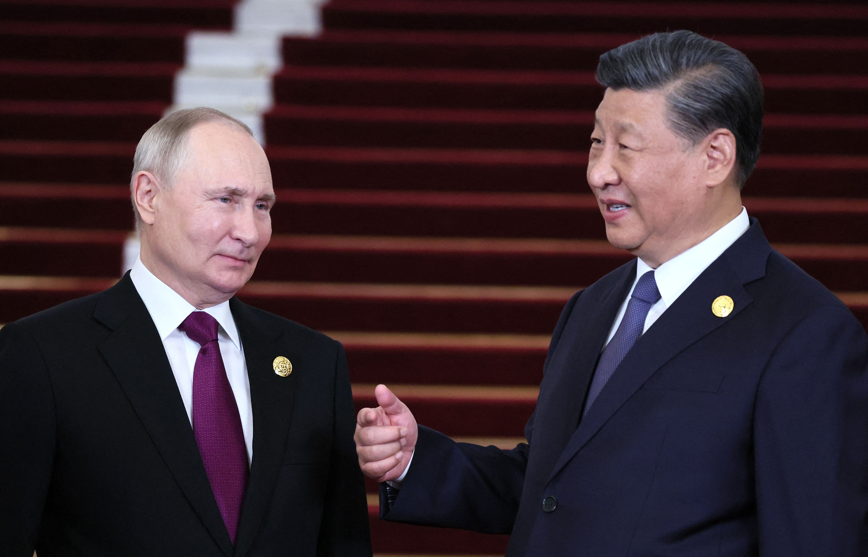 Russia’s President Vladimir Putin and Chinese President Xi Jinping attend an event n Beijing in October 2023. Photo: TNS