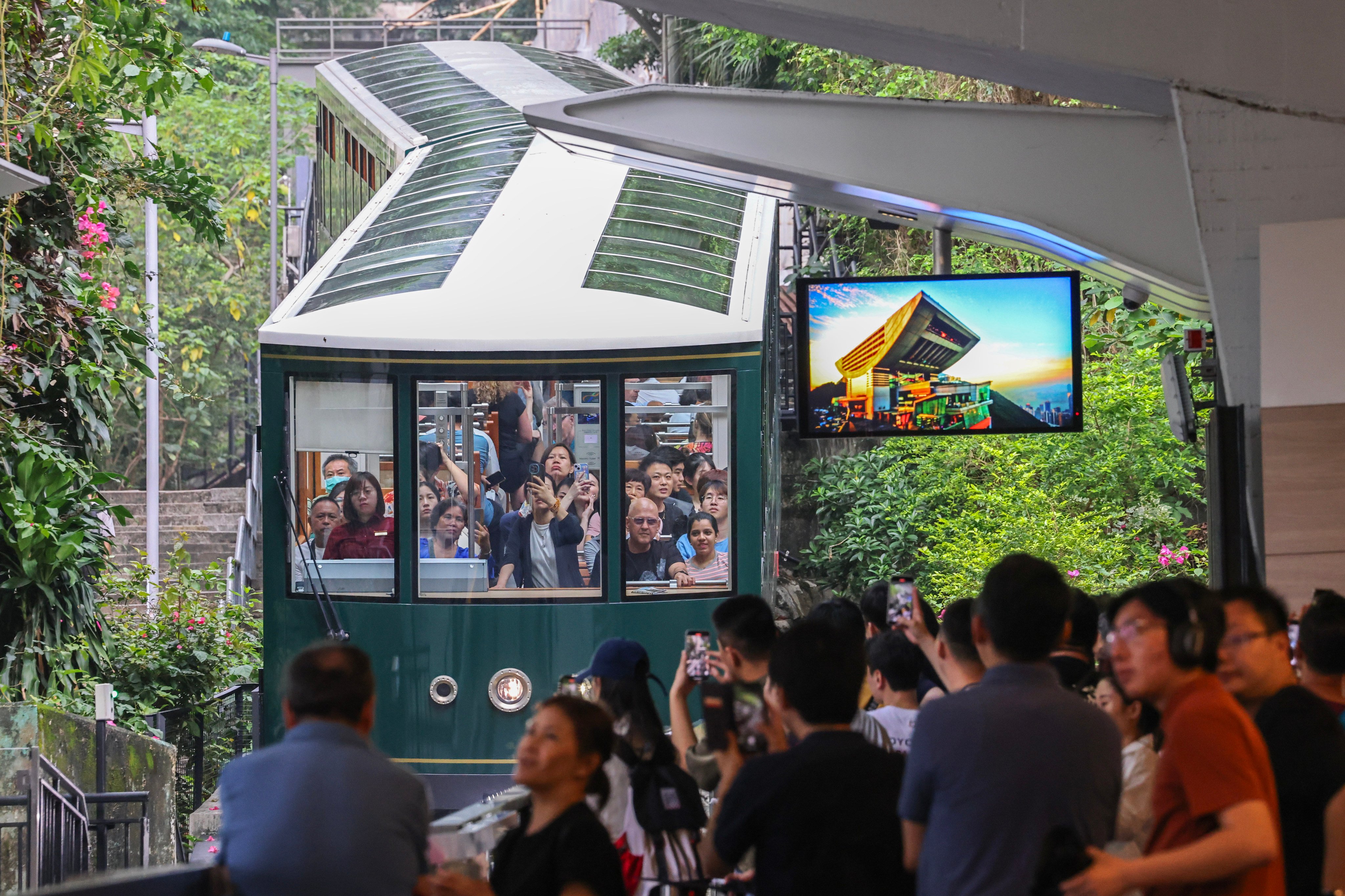 A recruitment scheme for volunteers will be expanded to new locations such as the Peak Tram terminus in Central, authorities have said. Photo: Dickson Lee