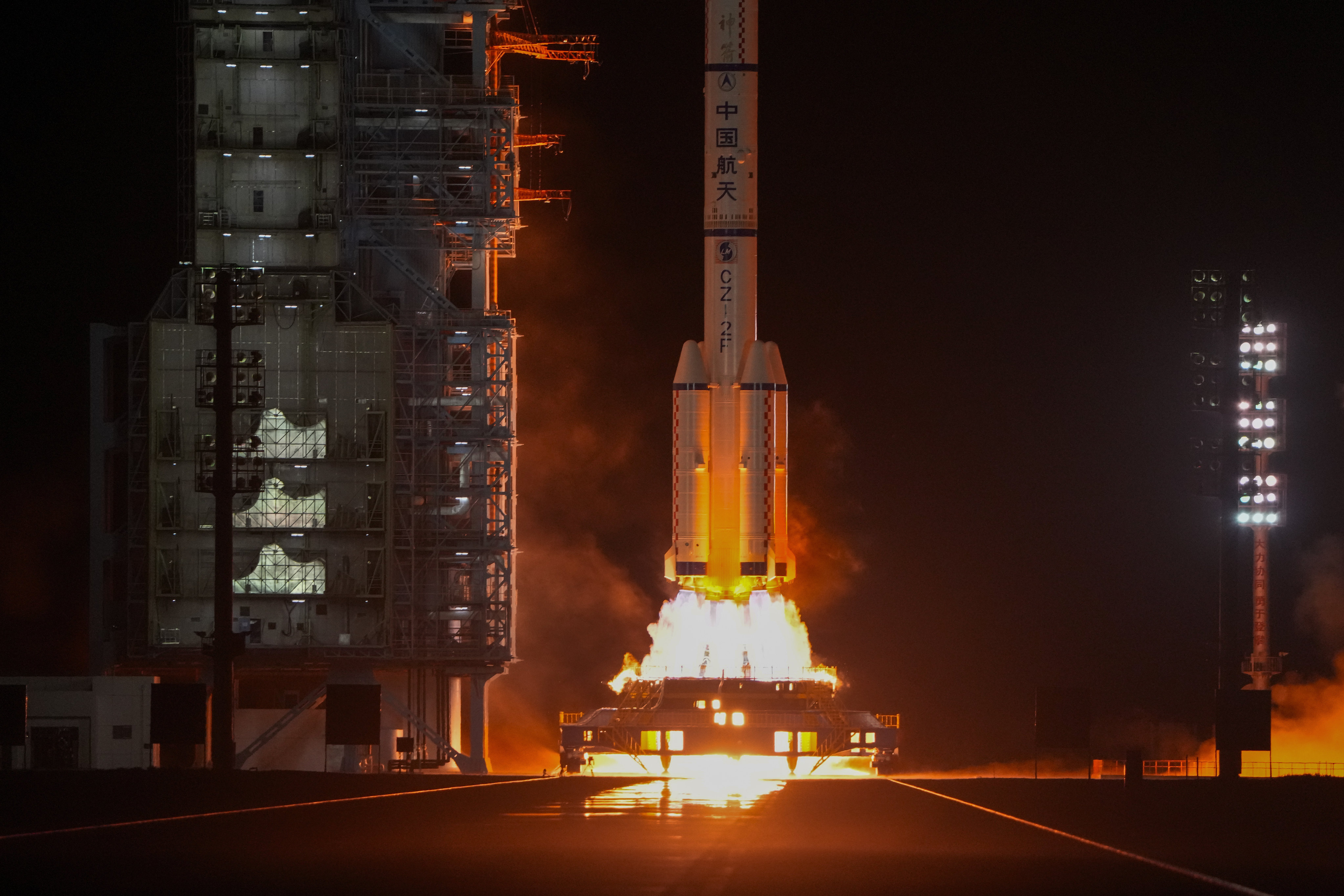 A Long March rocket carrying a crew of Chinese astronauts in the Shenzhou-18 spacecraft blasts off. Photo: AP