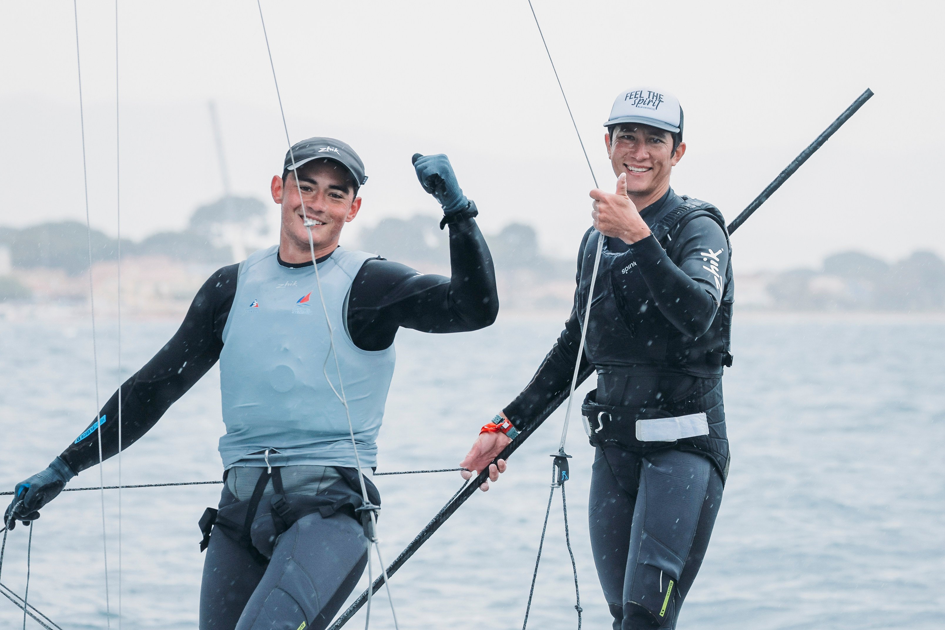 Akira Sakai and Russell Aylsworth celebrate after clinching qualification for the Paris Olympics. Photo: Handout