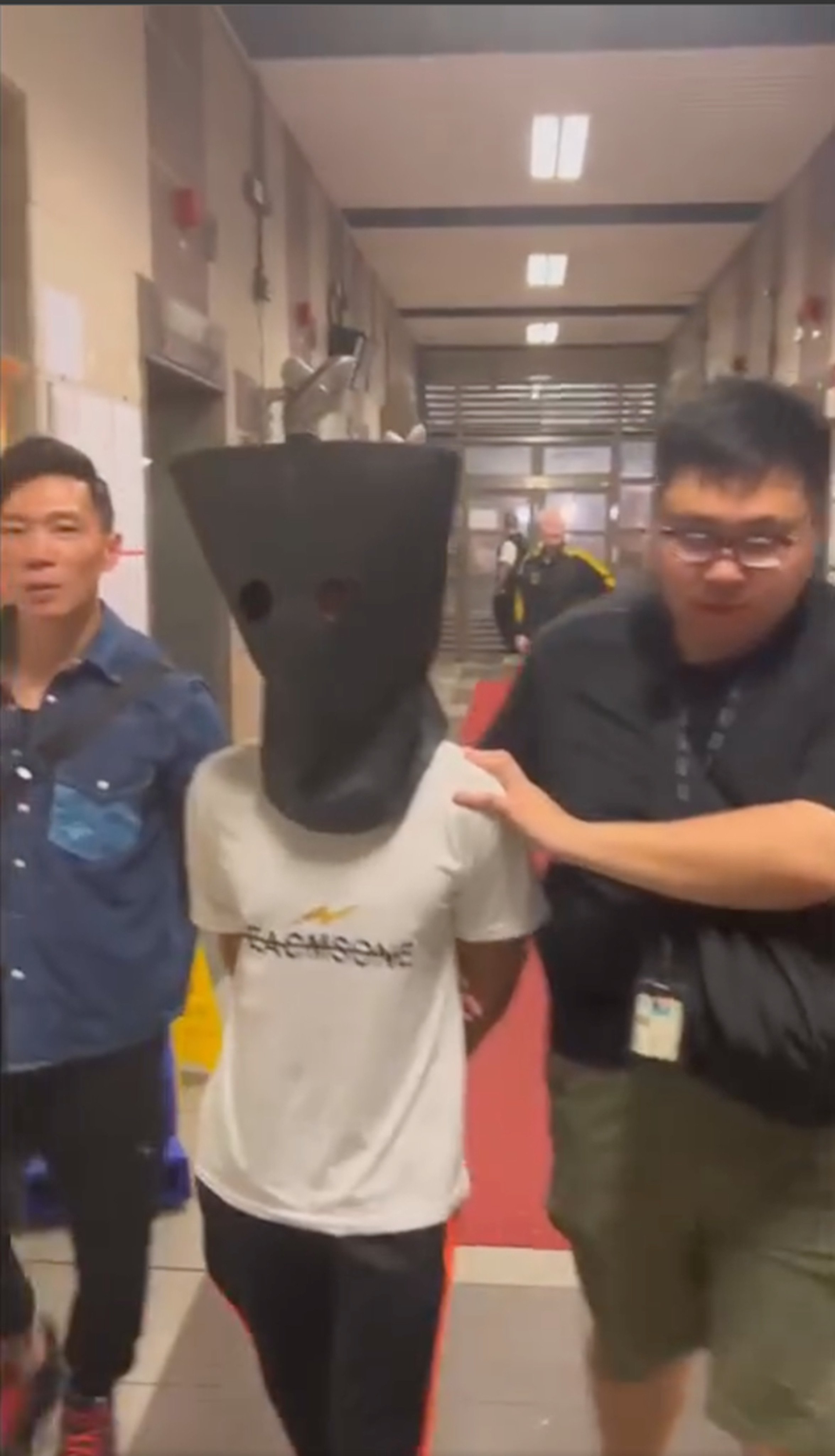 The suspect was arrested after police saw water-filled bags being hurled at children from atop an estate building. Photo: Facebook/Hong Kong Police