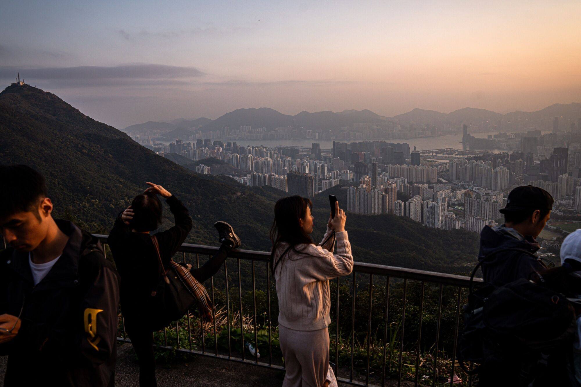 Residential buildings in Hong Kong. In the next 12 months, 31,000 new residential units are expected to be launched by developers, property consultancy JLL says. Photo: Bloomberg