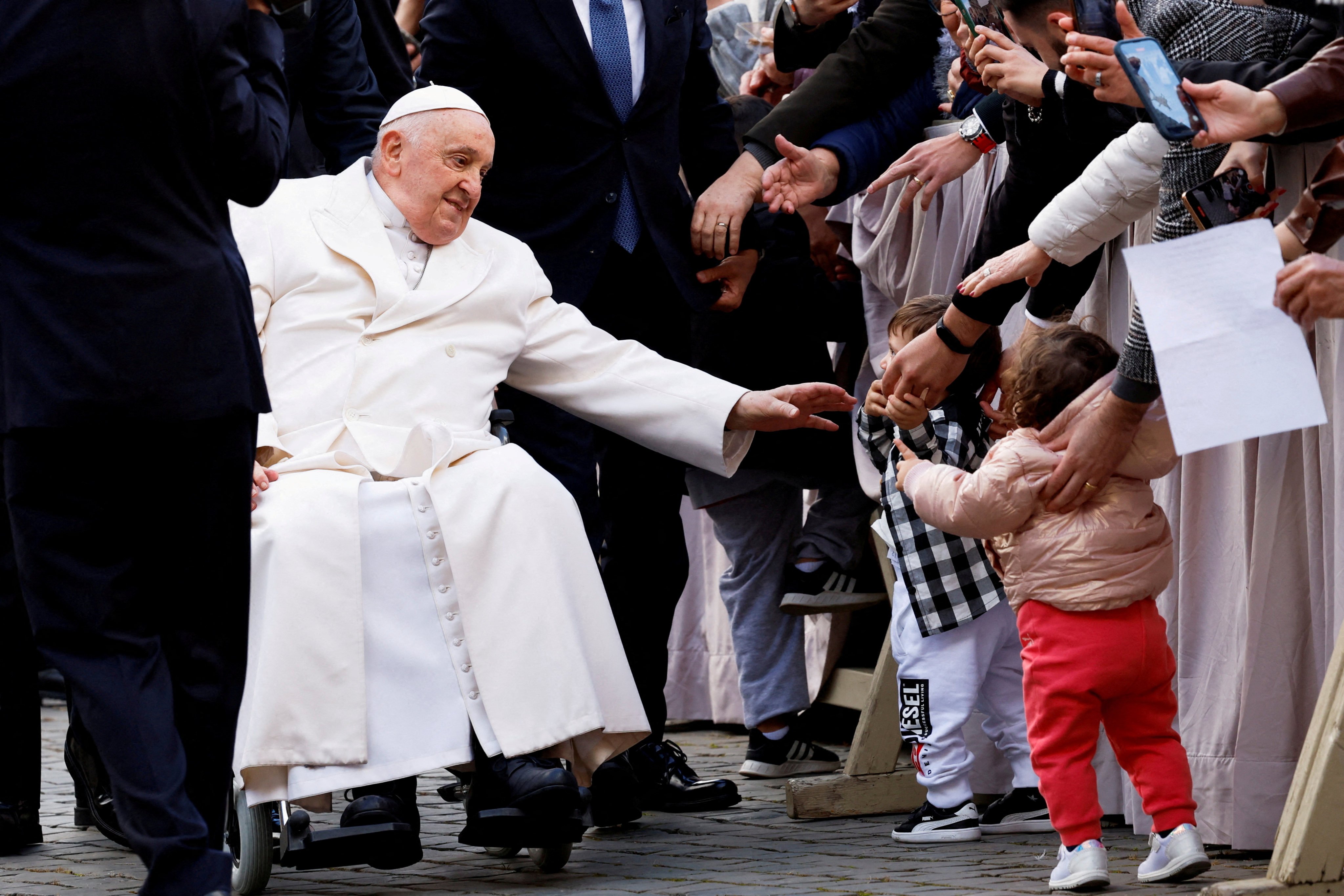 Pope Francis greets the faithful in Saint Peter’s Square at the Vatican. Photo: Reuters