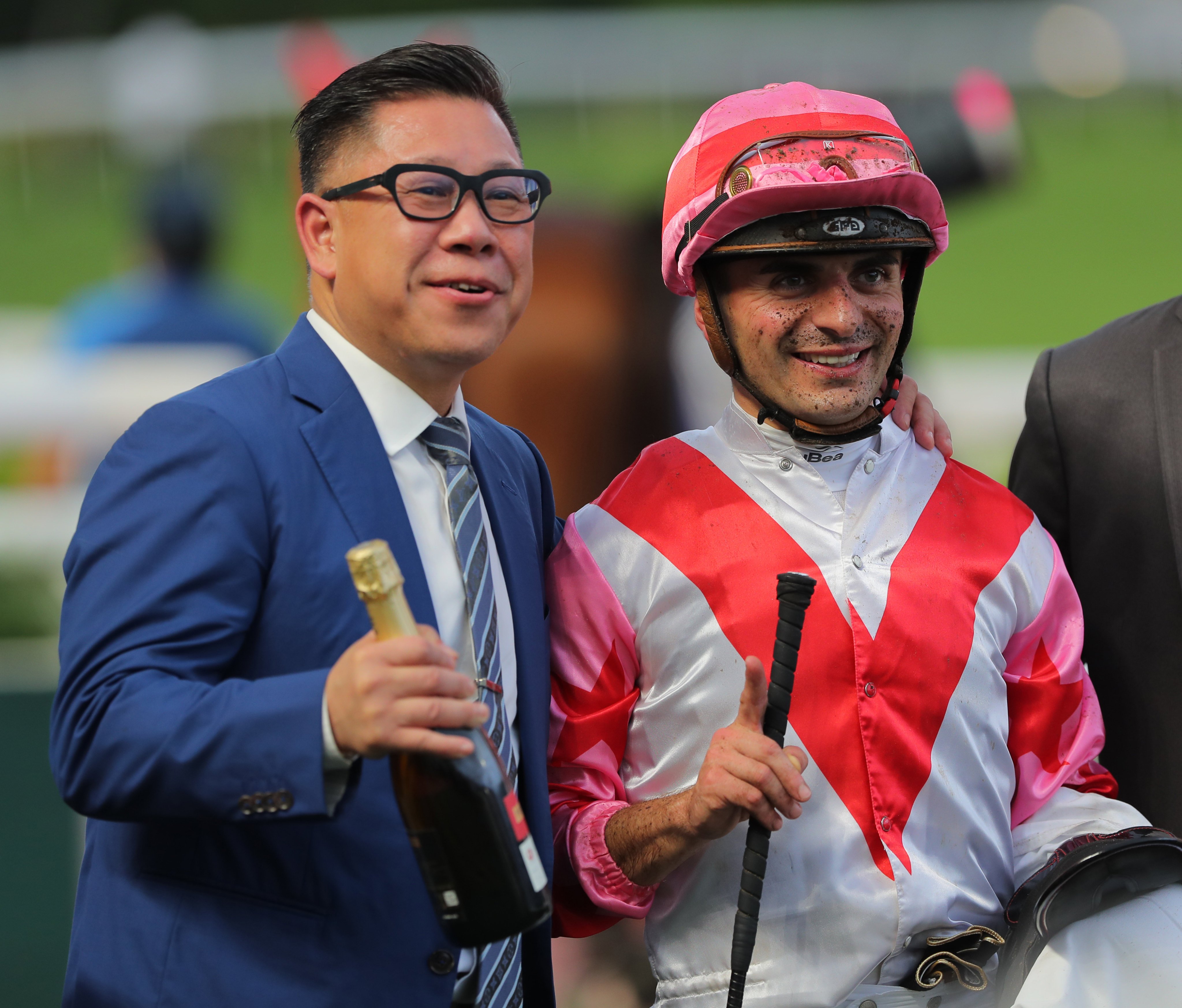 Dennis Yip and Andrea Atzeni celebrate after Phoenix Light wins at Sha Tin. Photos: Kenneth Chan