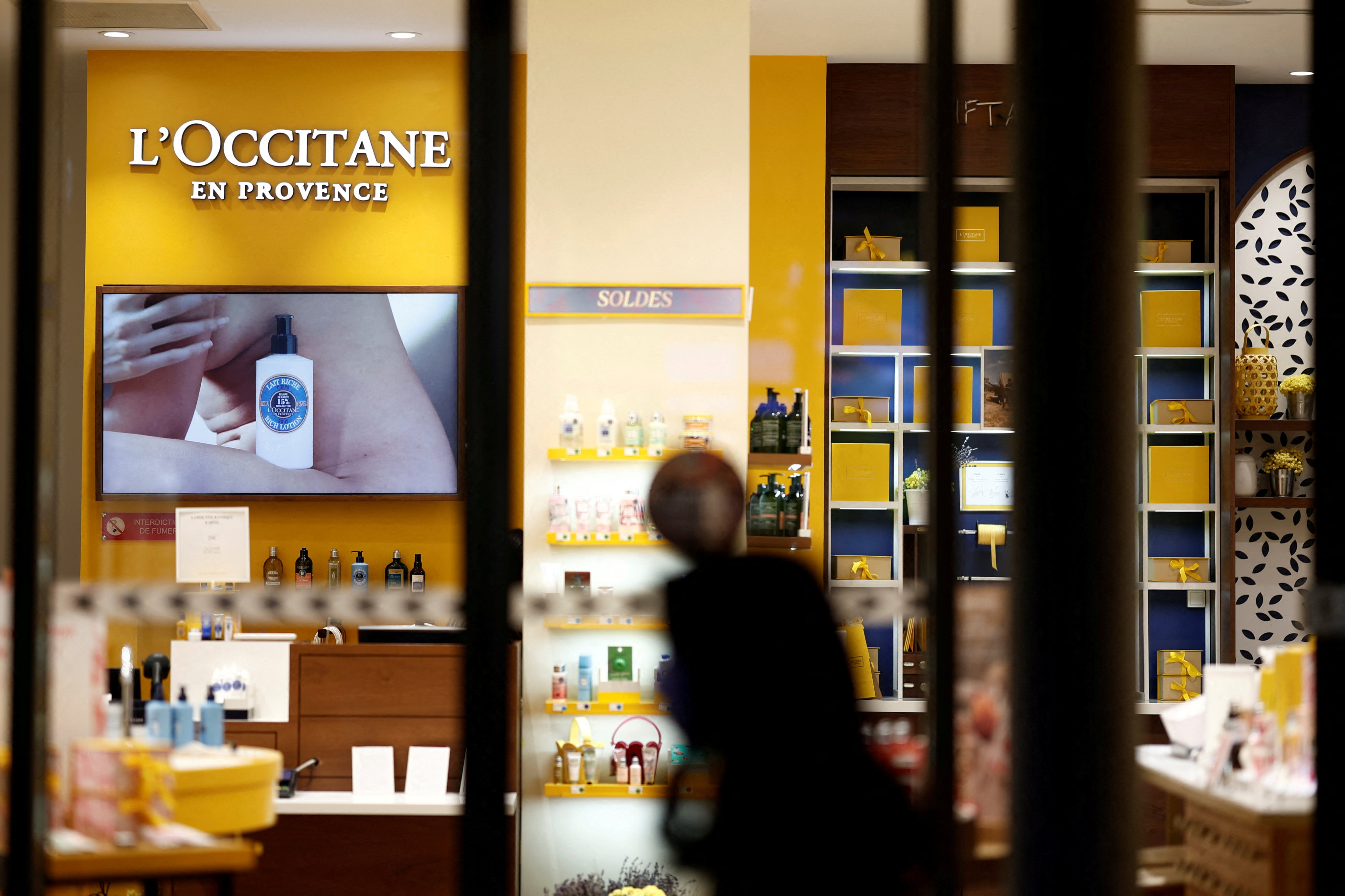 Cosmetic products are displayed in the window of a L’Occitane cosmetics store in Paris on February 6, 2024. Photo: Reuters