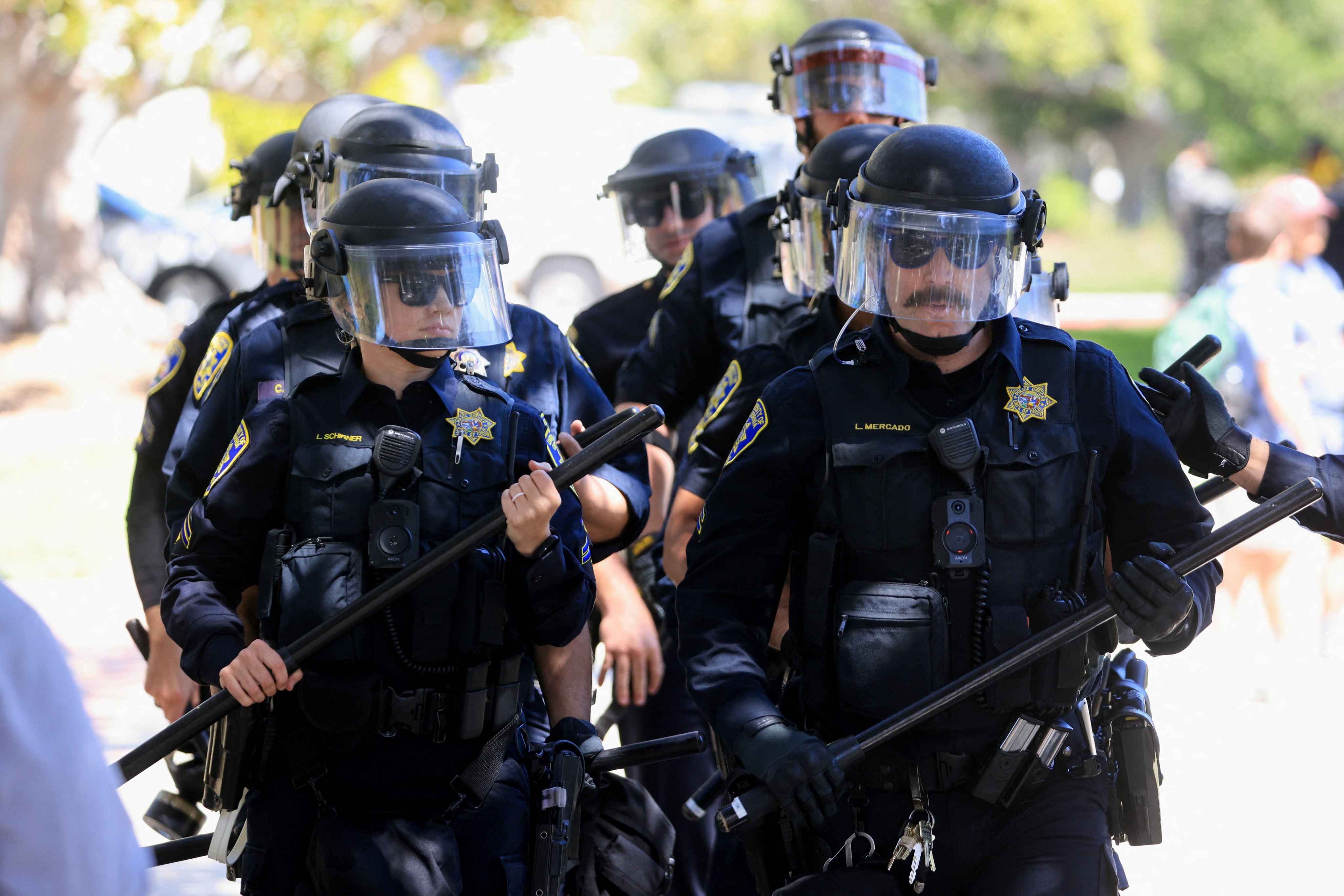 UCLA police armed with batons separated sparring groups on campus on Sunday. Photo: Reuters