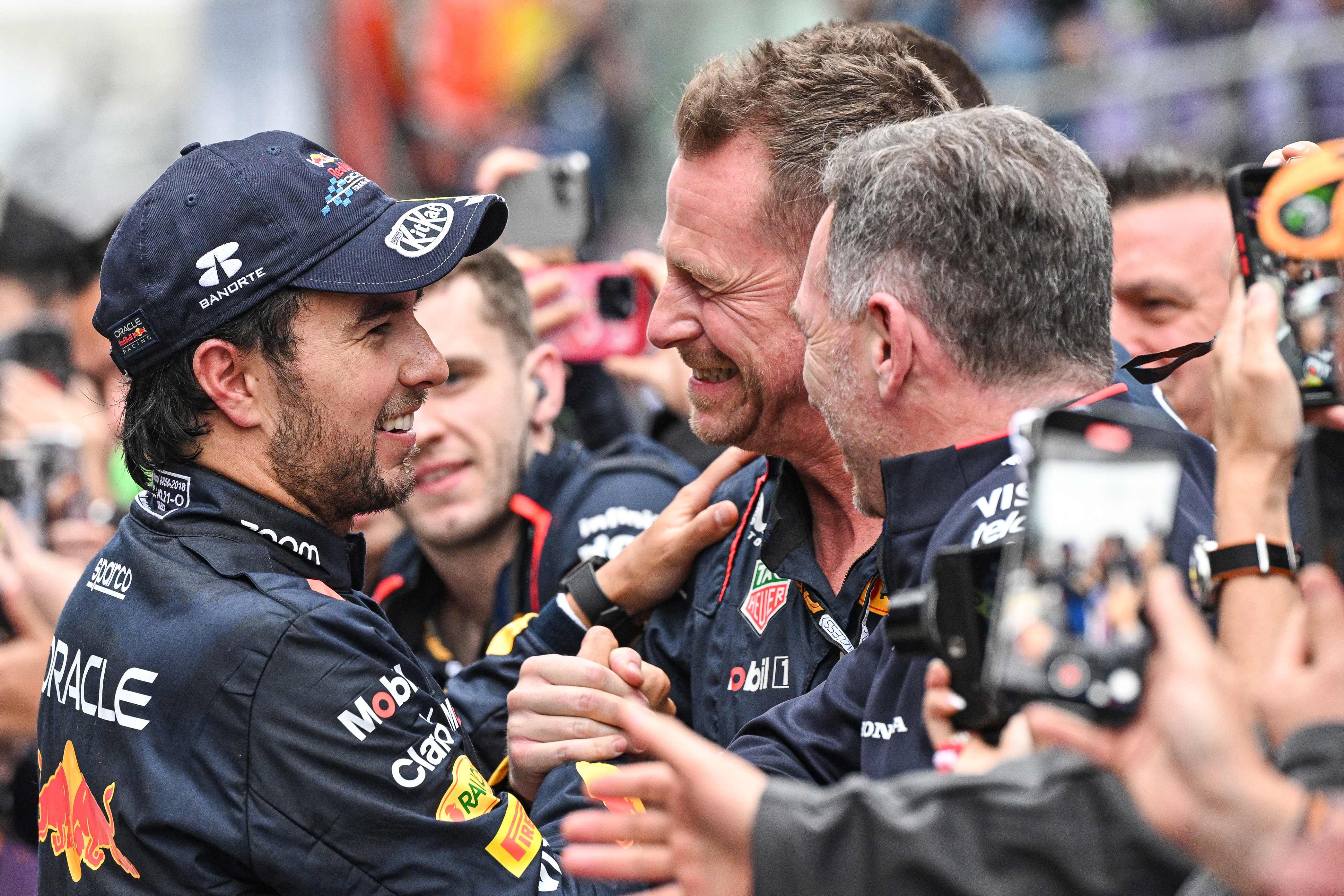 Red Bull Racing team principal Christian Horner (right) celebrates with Perez (left) after the Chinese Grand Prix in Shanghai two weekends ago. Photo: AFP