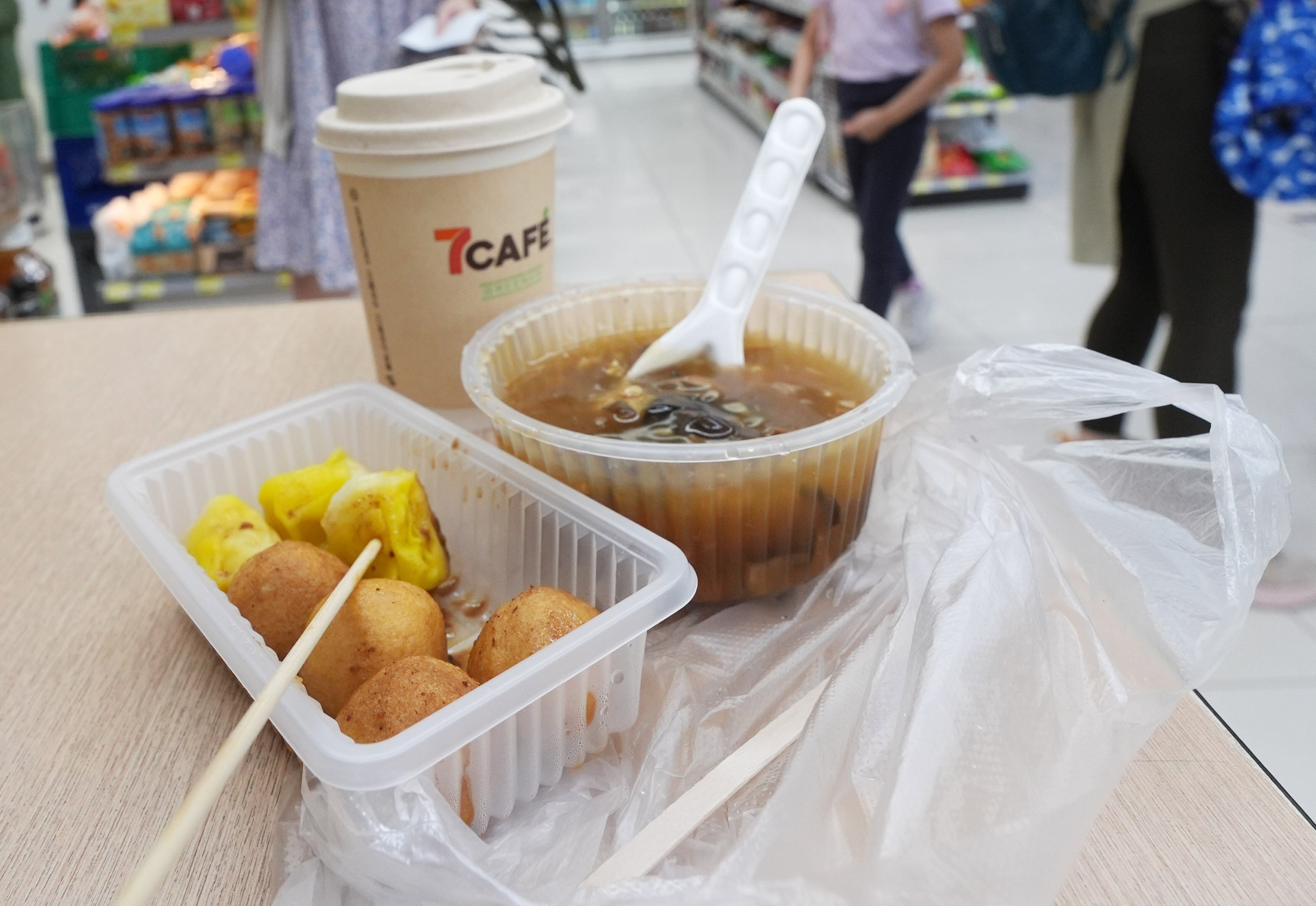 A Post reporter received conflicting answers from three different 7-Eleven outlets on whether he could dine-in after ordering siu mai and fish balls. Photo: Eugene Lee