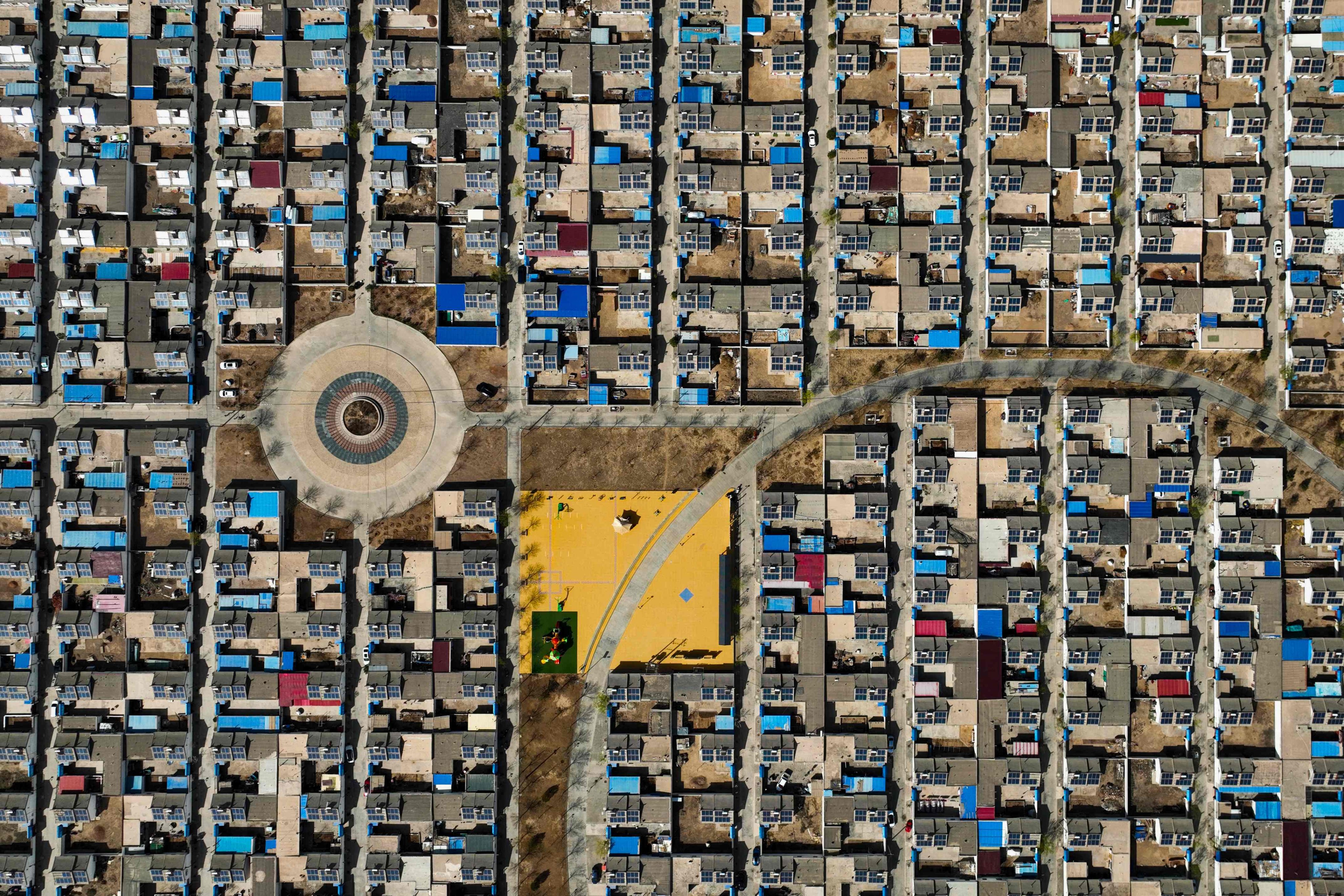 Residential buildings with solar panels are seen from the air in Yinchuan, Ningxia, in northwestern China, on March 31. US Treasury Secretary Janet Yellen recently said China should address its overcapacity issue, particularly with regard to clean energy products. Photo: AFP 