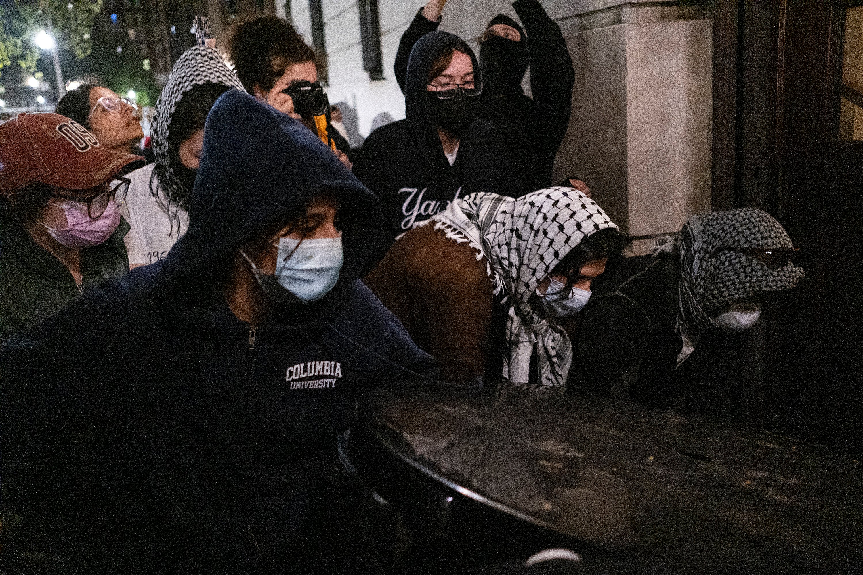 Students with the Gaza Solidarity Encampment block the entrance of Hamilton Hall at Columbia University after taking over it on Tuesday. Photo: AP
