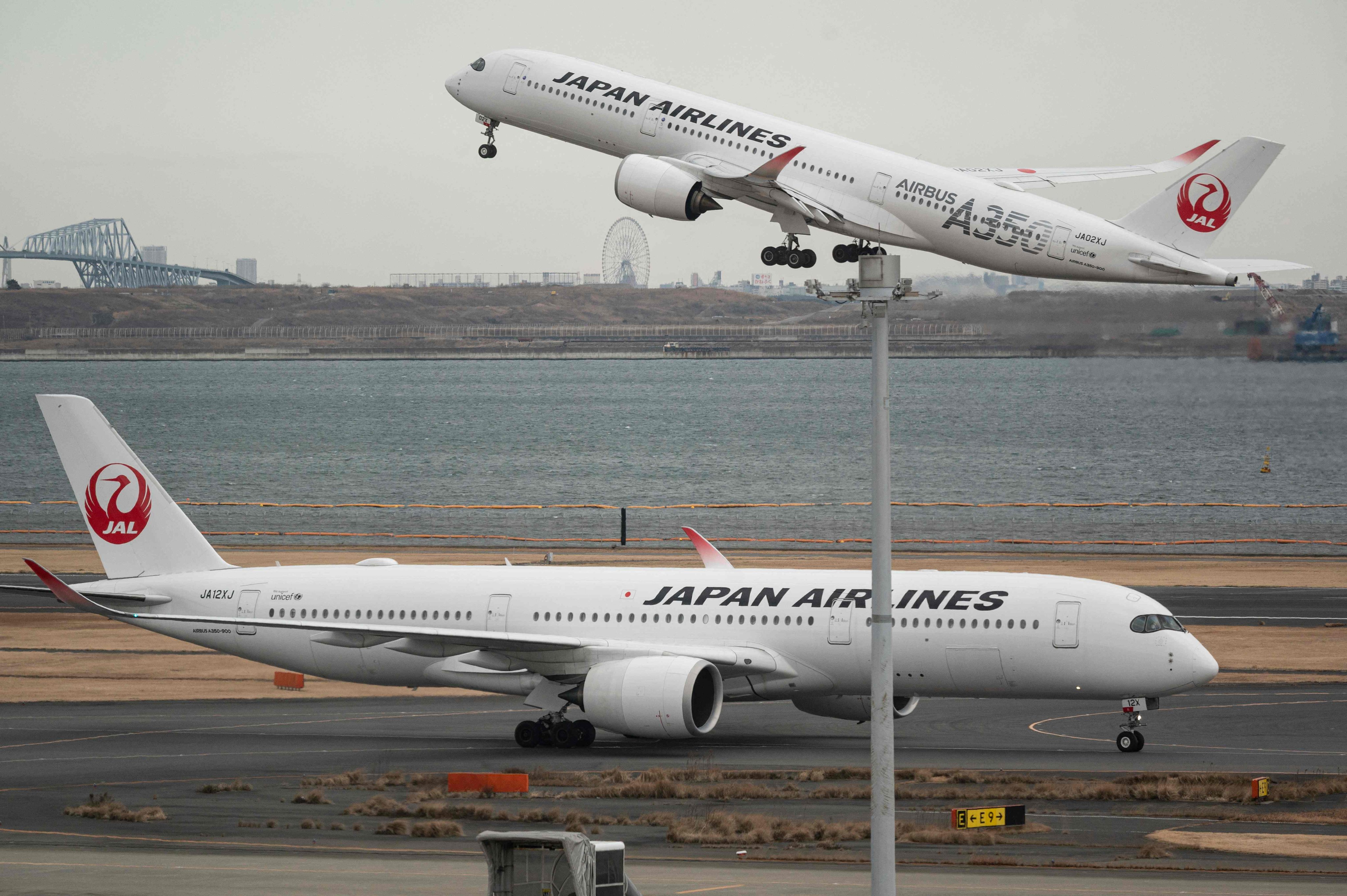 A Japan Airlines passenger jet takes off at Tokyo International Airport. Photo: AFP