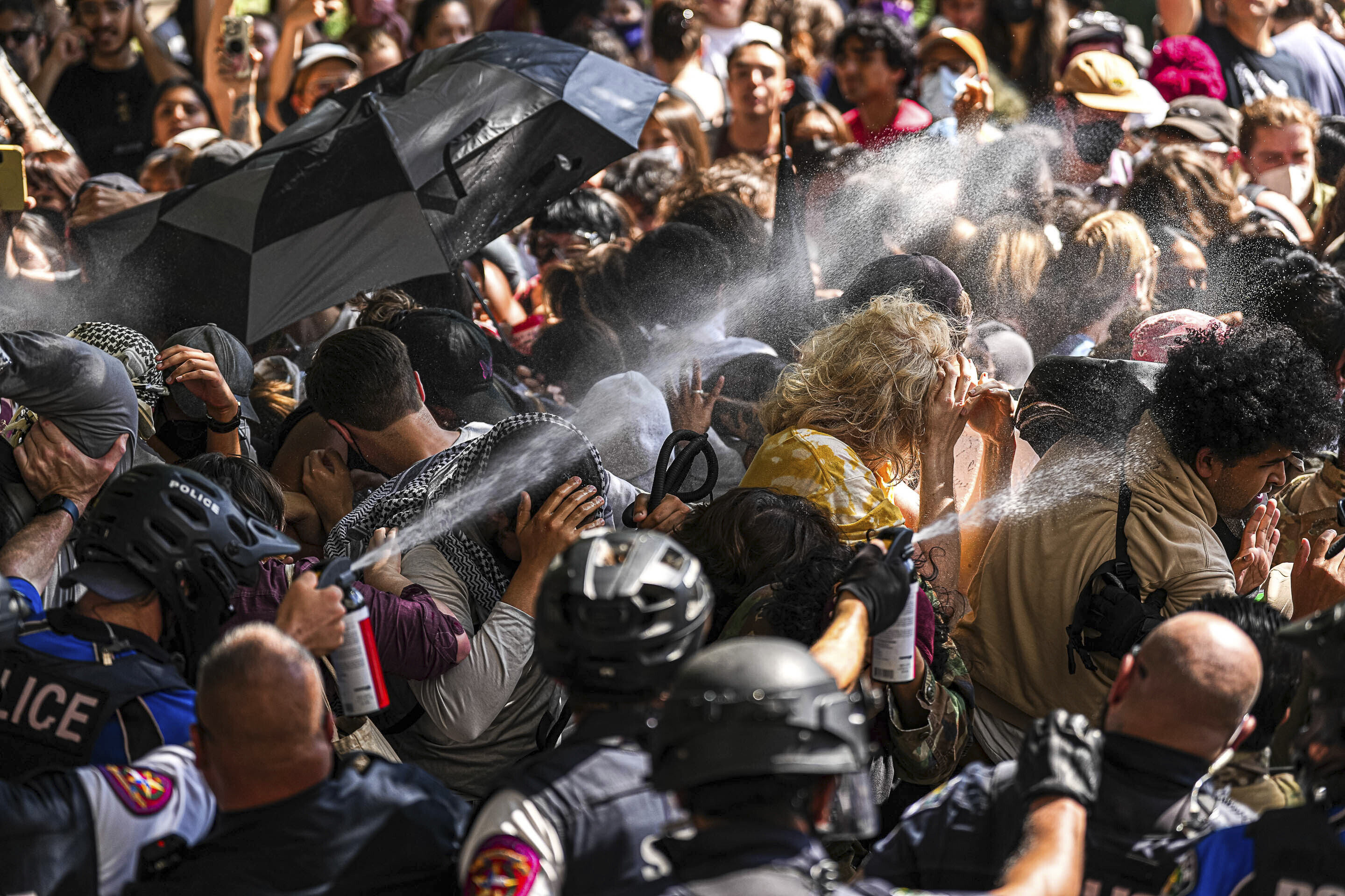 Police pepper spray pro-Palestinian protesters at University of Texas in Austin. Photo: Austin American-Statesman via AP