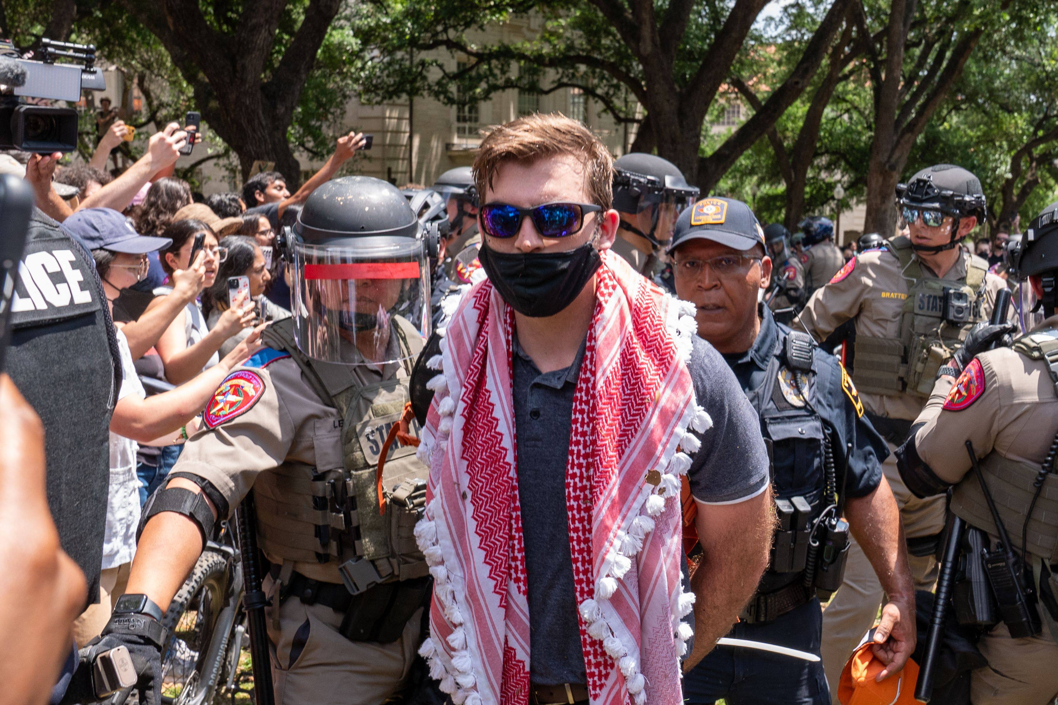 A pro-Palestinian protester is arrested by Texas State Troopers at the University of Texas in Austin on Monday. Photo: AFP