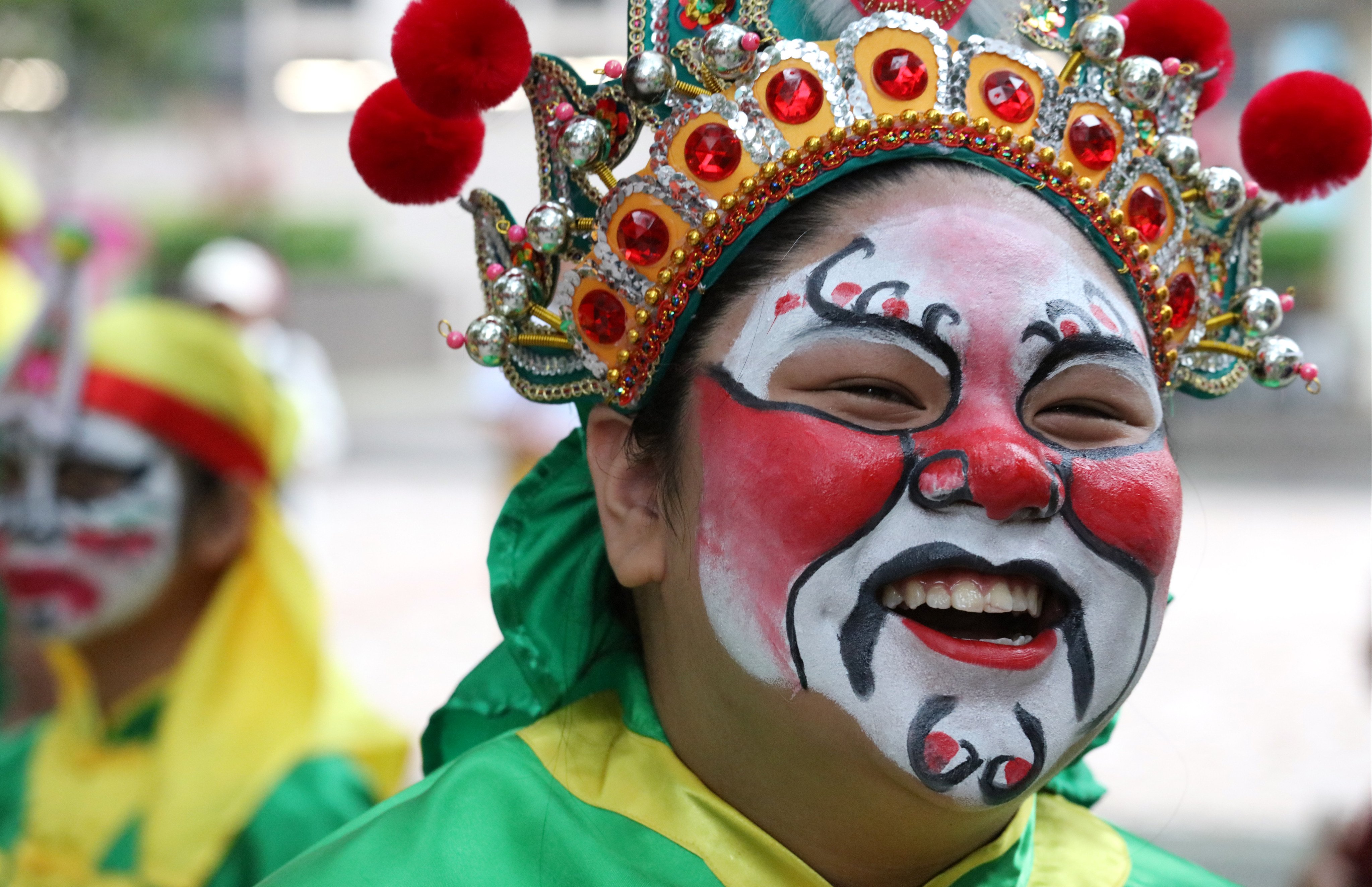 A participant in a Tin Hau Festival procession in Shap Pat Heung, Yuen Long, Hong Kong in celebration of the birthday of the Queen of Heaven. Photo: Felix Wong