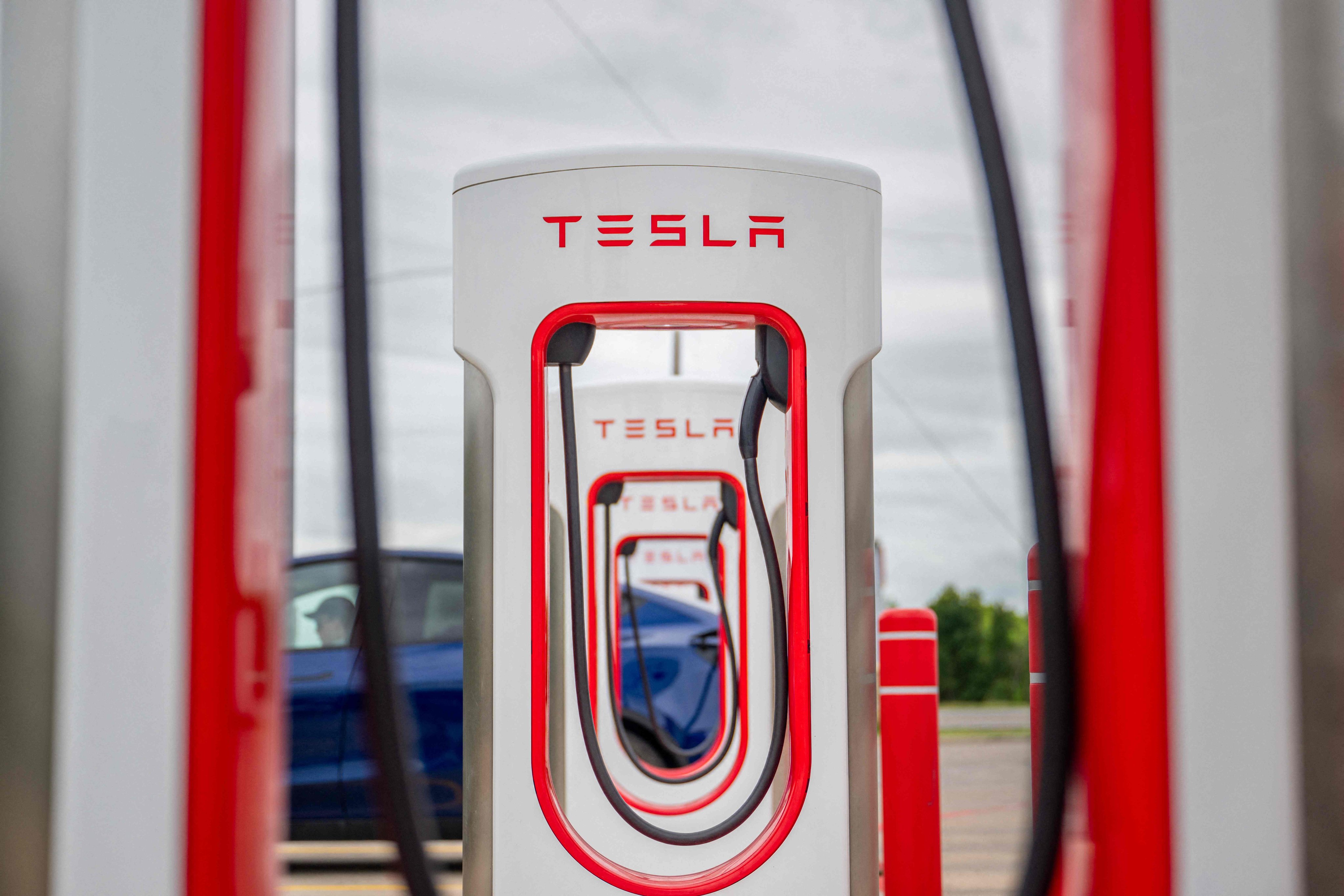Tesla Supercharging stations near a Circle K gas station on April 23, 2024 in Austin, Texas. Photo: Getty Images via AFP