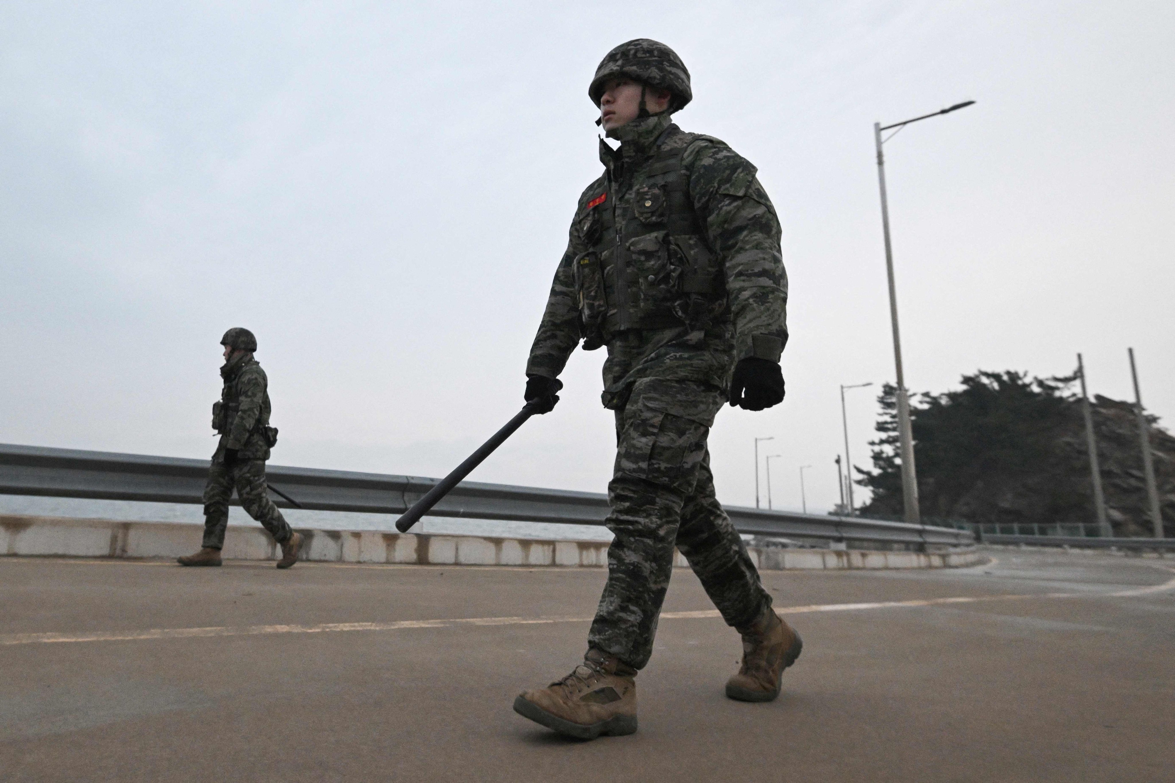 South Korean marines patrol a coastal road on Yeonpyeong island, near the ‘northern limit line’ sea boundary with North Korea. Seoul has been reluctant to commit itself in the event of a Taiwan crisis, despite being an American ally. Photo: AFP