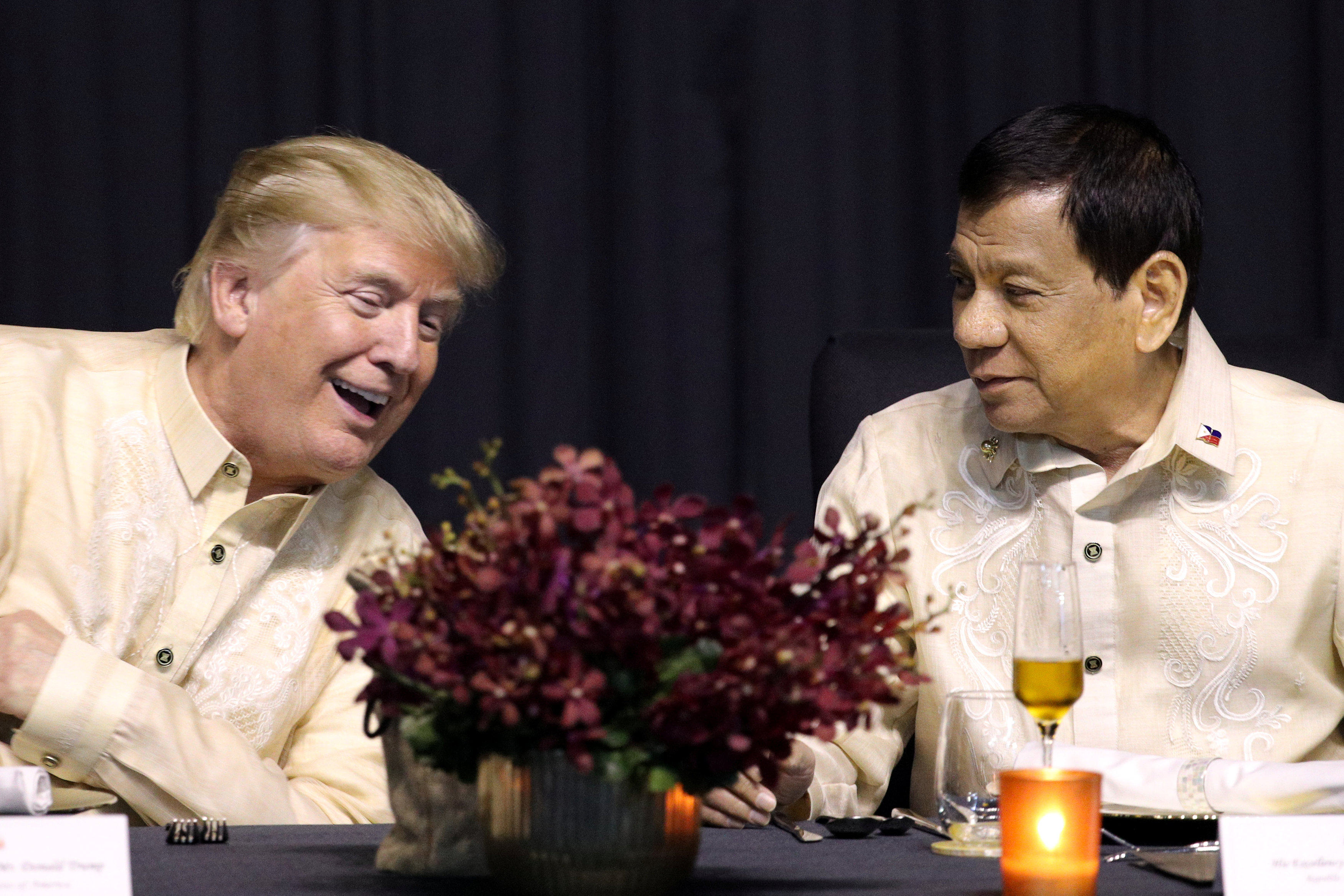 Former US President Donald Trump speaks with former Philippines President Rodrigo Duterte during a dinner marking Asean’s 50th anniversary in Manila in 2017. Photo: Reuters 