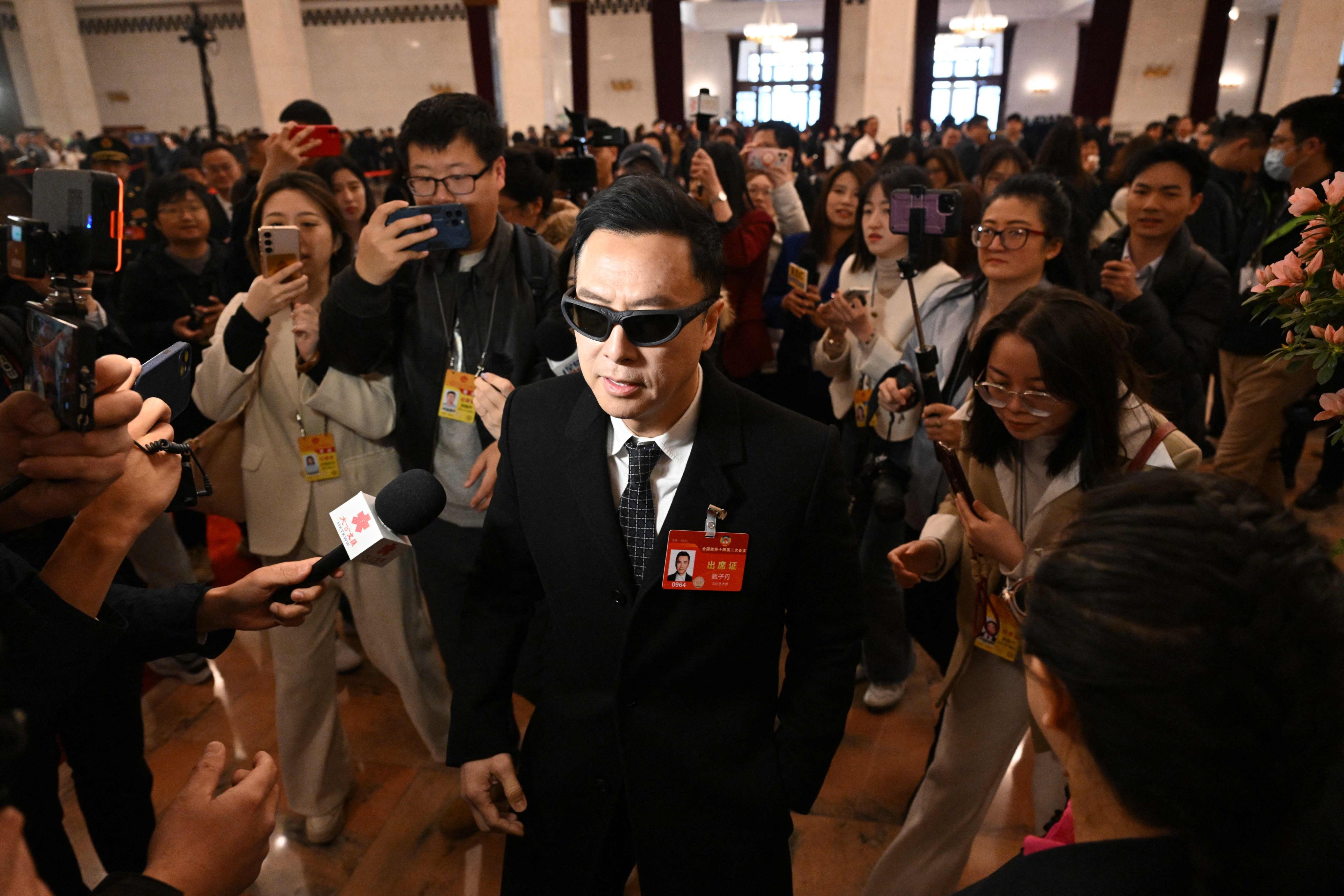 Hong Kong actor Donnie Yen featured in the fictitious article promoting financial investment apps. Photo: AFP