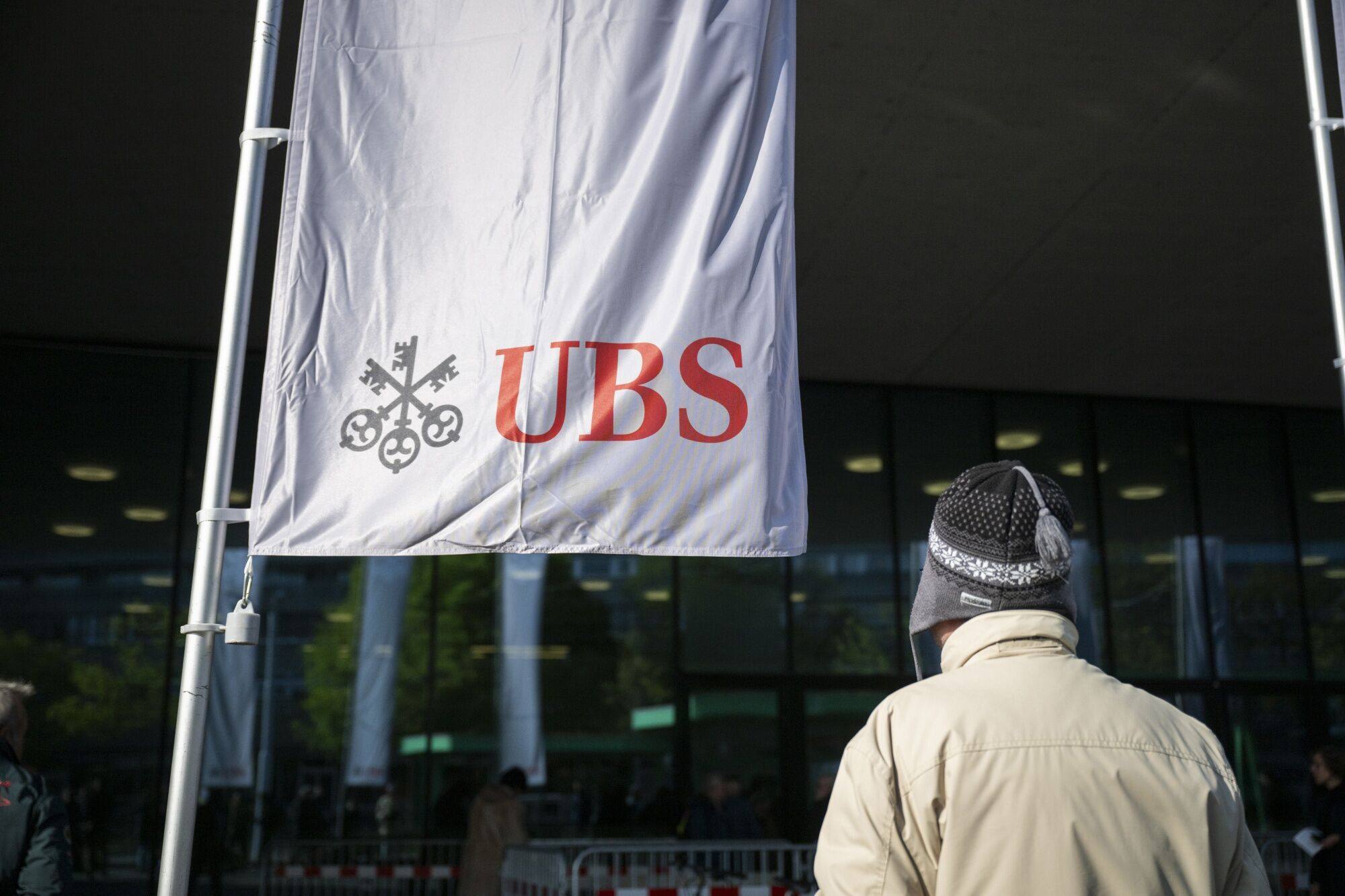 A company banner outside the UBS Group AG annual general meeting (AGM) at St. Jakobshalle in Basel, Switzerland, on Wednesday, April 24, 2024. Photo: Bloomberg