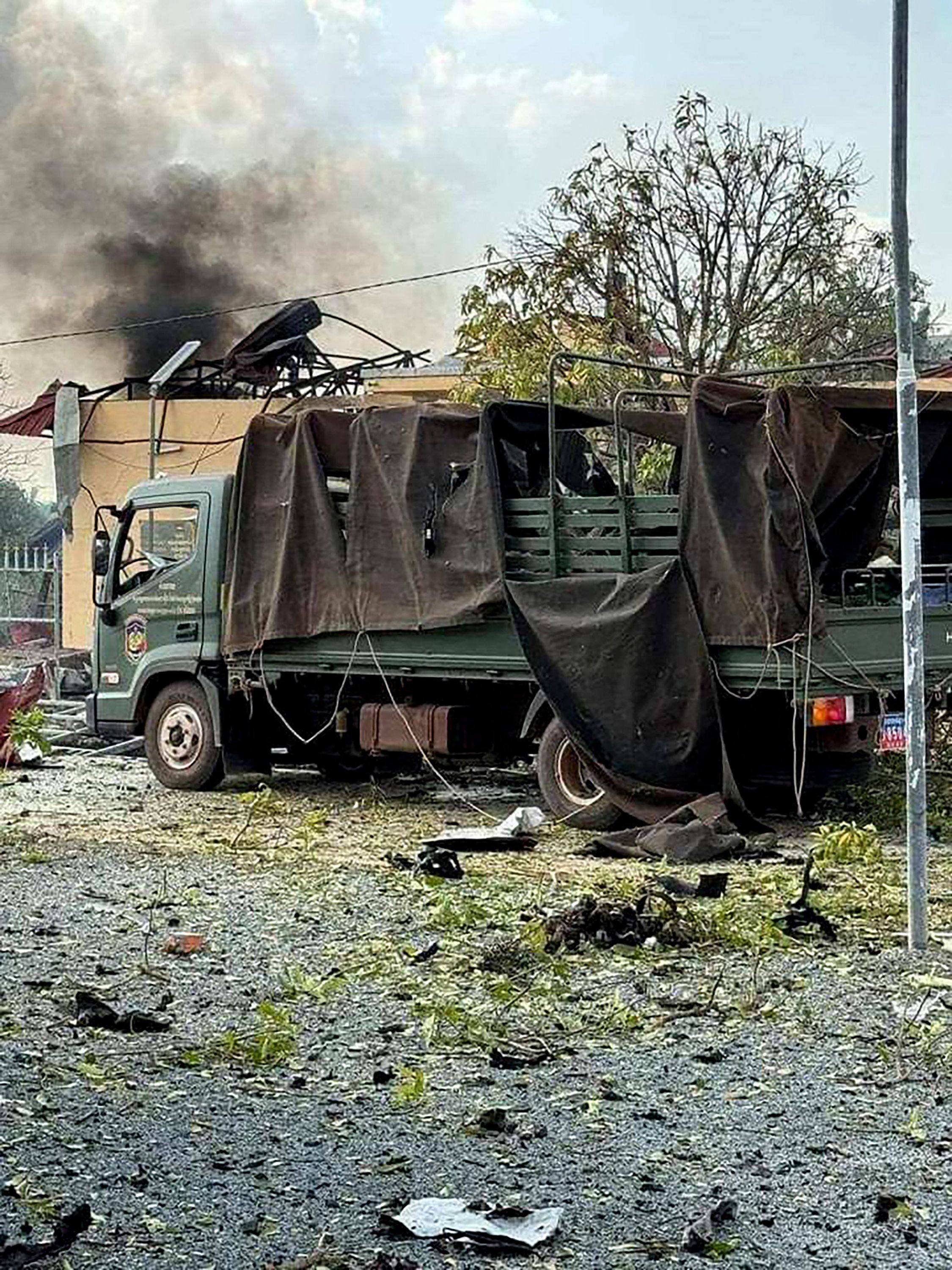 A military truck was damaged following an explosion at an army base in Cambodia’s Kampong Speu province on April 27. Photo: AFP