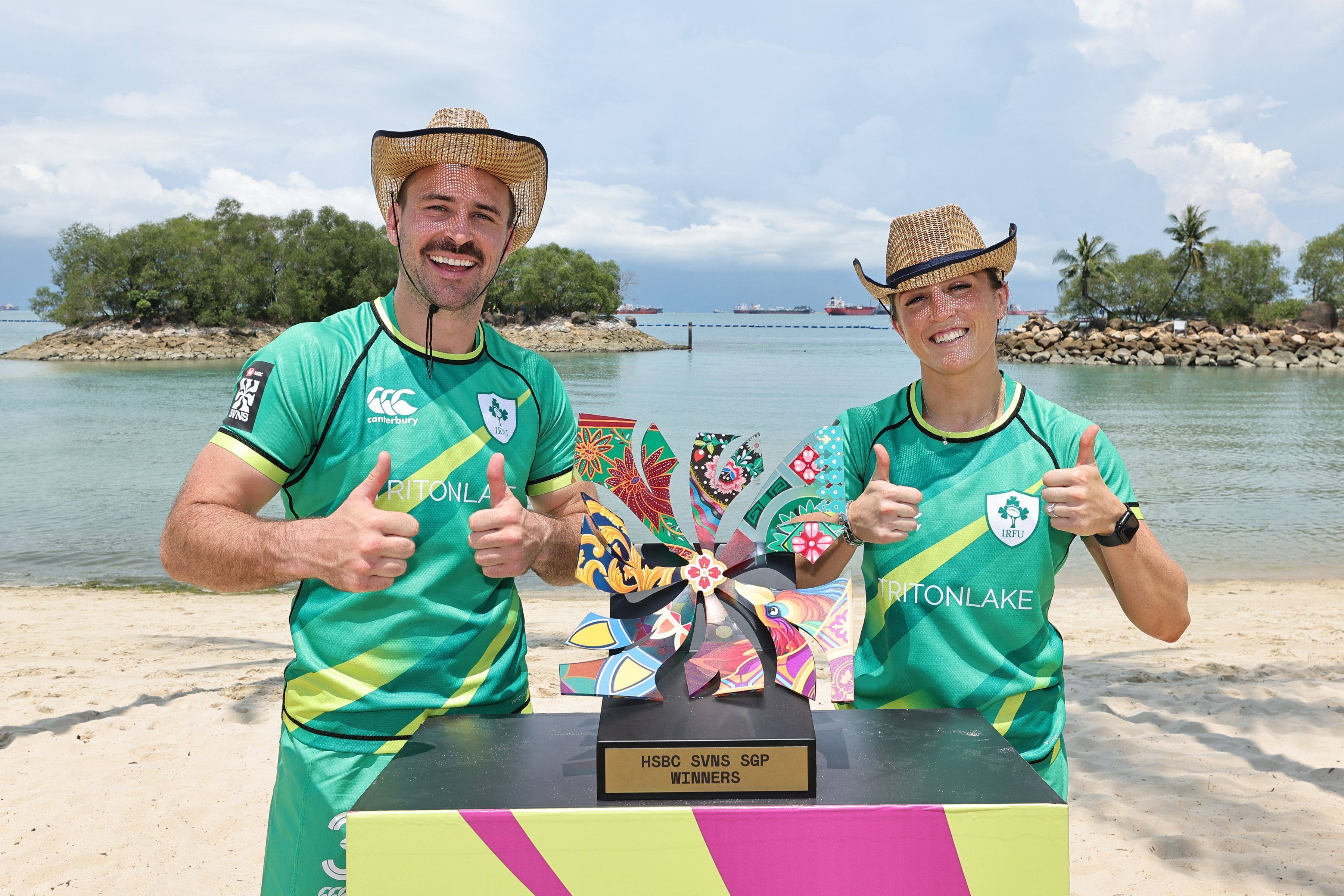 Irish team captains Harry McNulty (left) and Amee-Leigh Murphy Crowe at Siloso Beach, Sentosa for the photo call before the Singapore Sevens. Photo: World Rugby