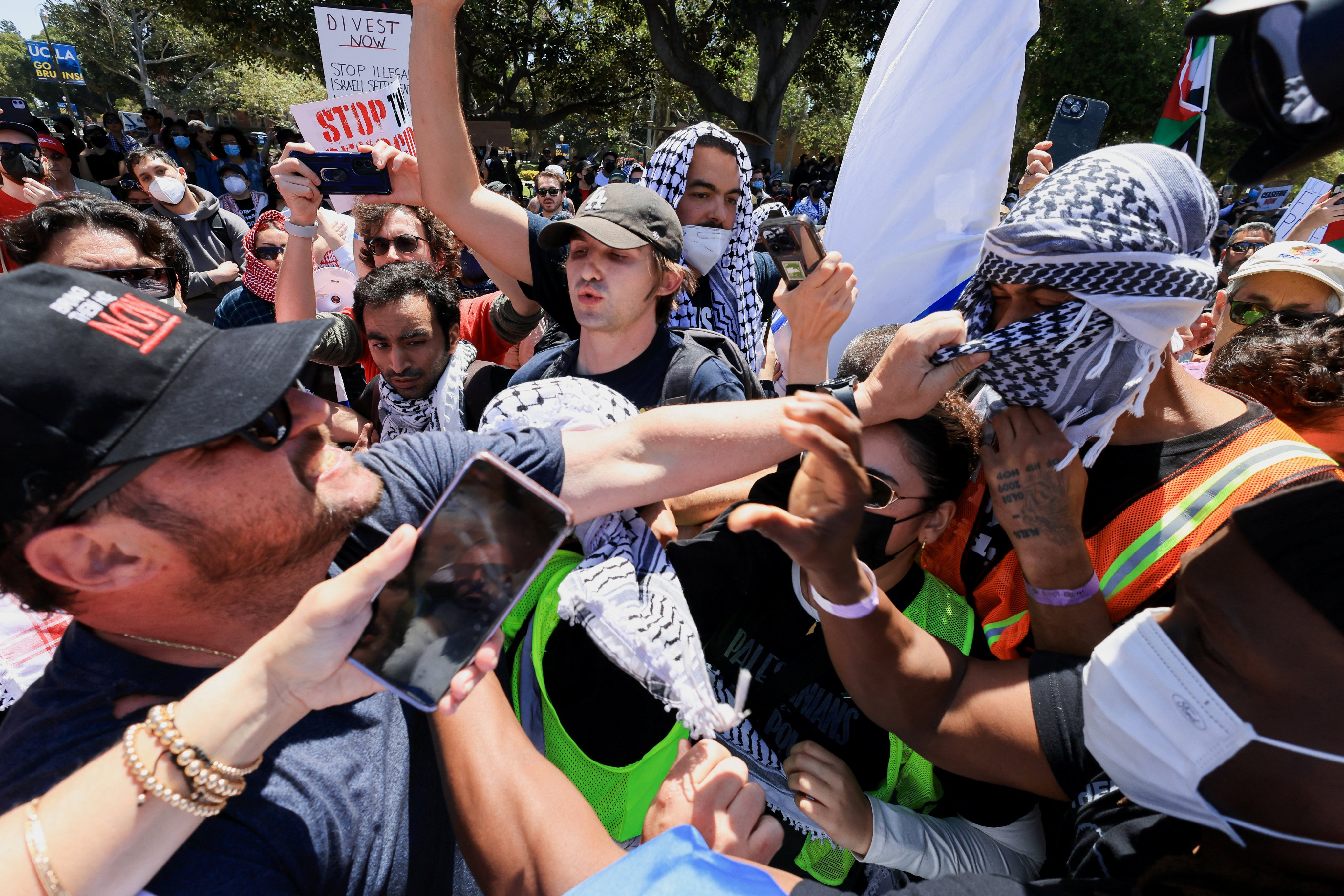 Pro-Israel protesters scuffle with those supporting Palestinians in Gaza, at the University of California Los Angeles on April 28. Photo: Reuters