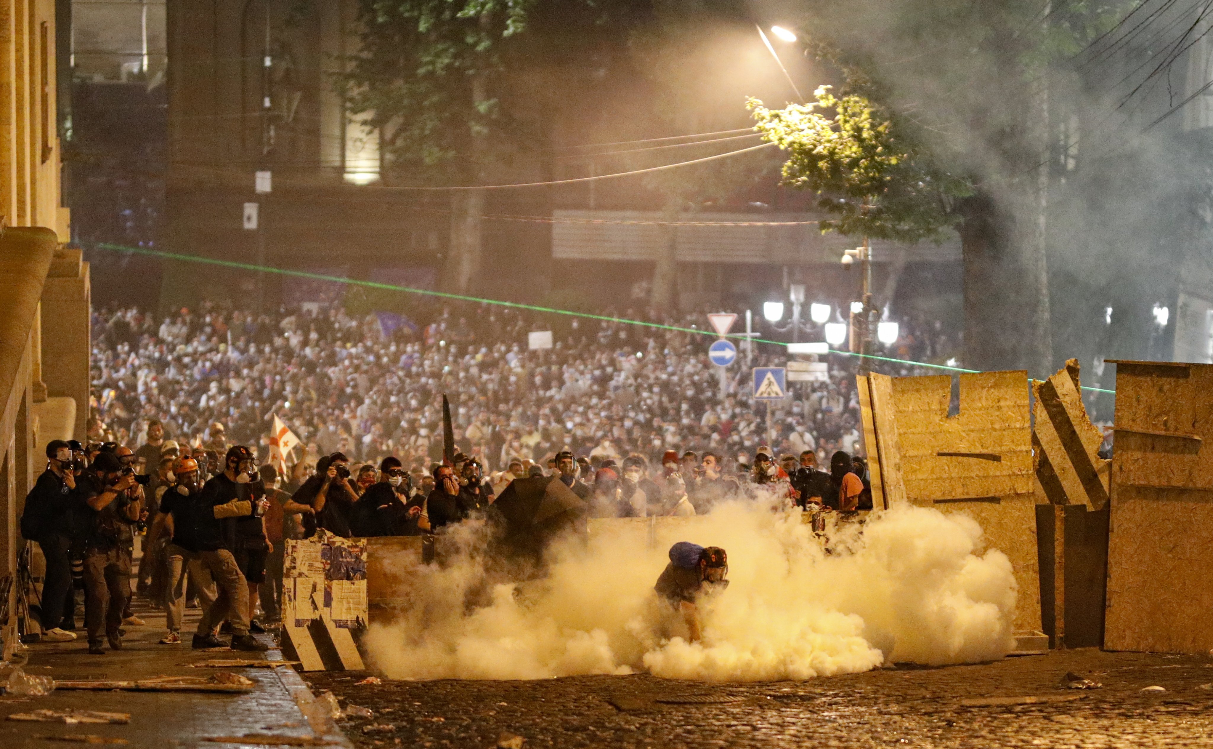 Protestors clash with riot police in Tbilisi, Georgia, on Wednesday. Photo: EPA-EFE