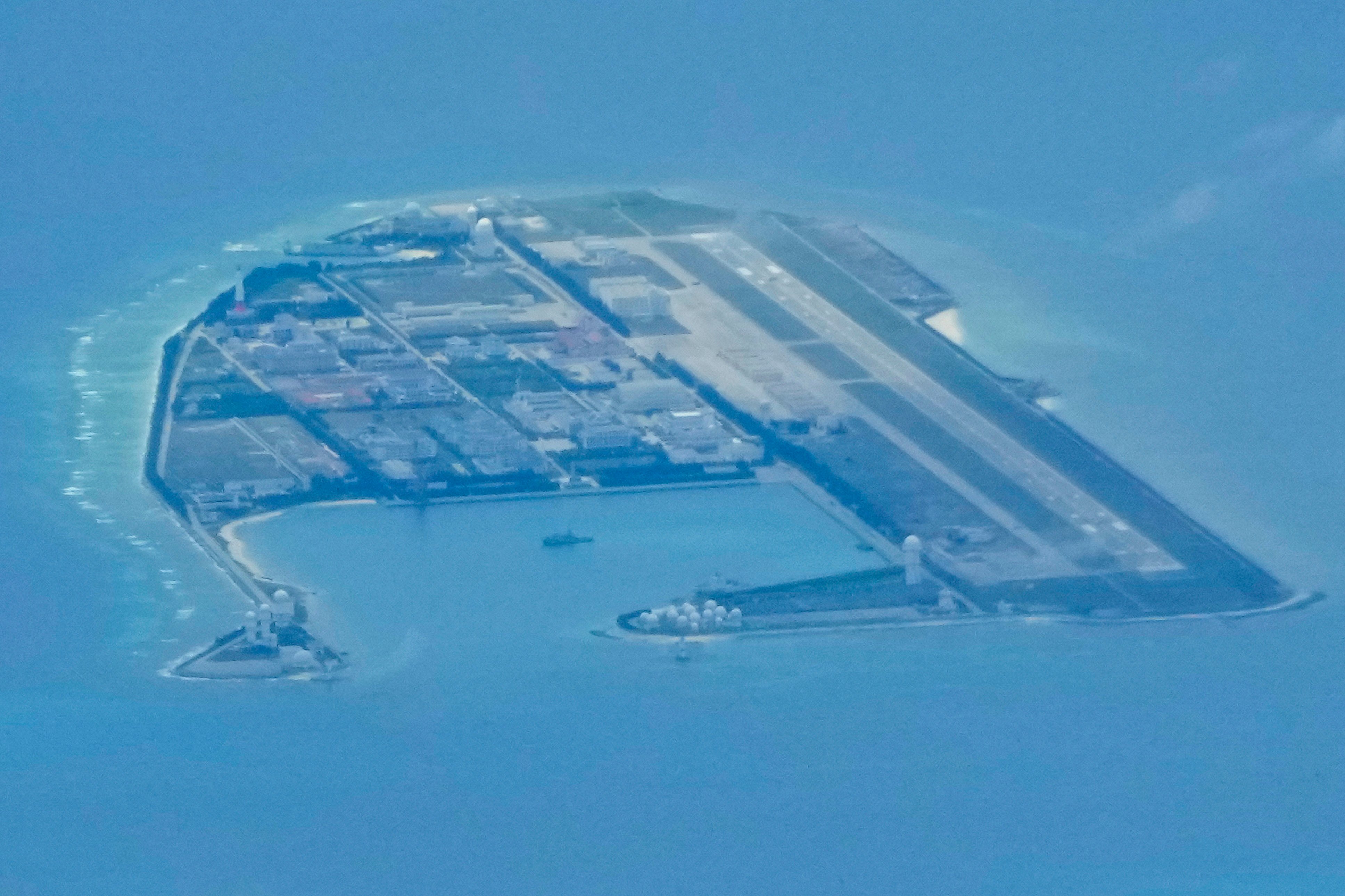 Chinese structures on Mischief Reef in the Spratlys group of islands in the South China Sea on March 20, 2022. Photo: AP 