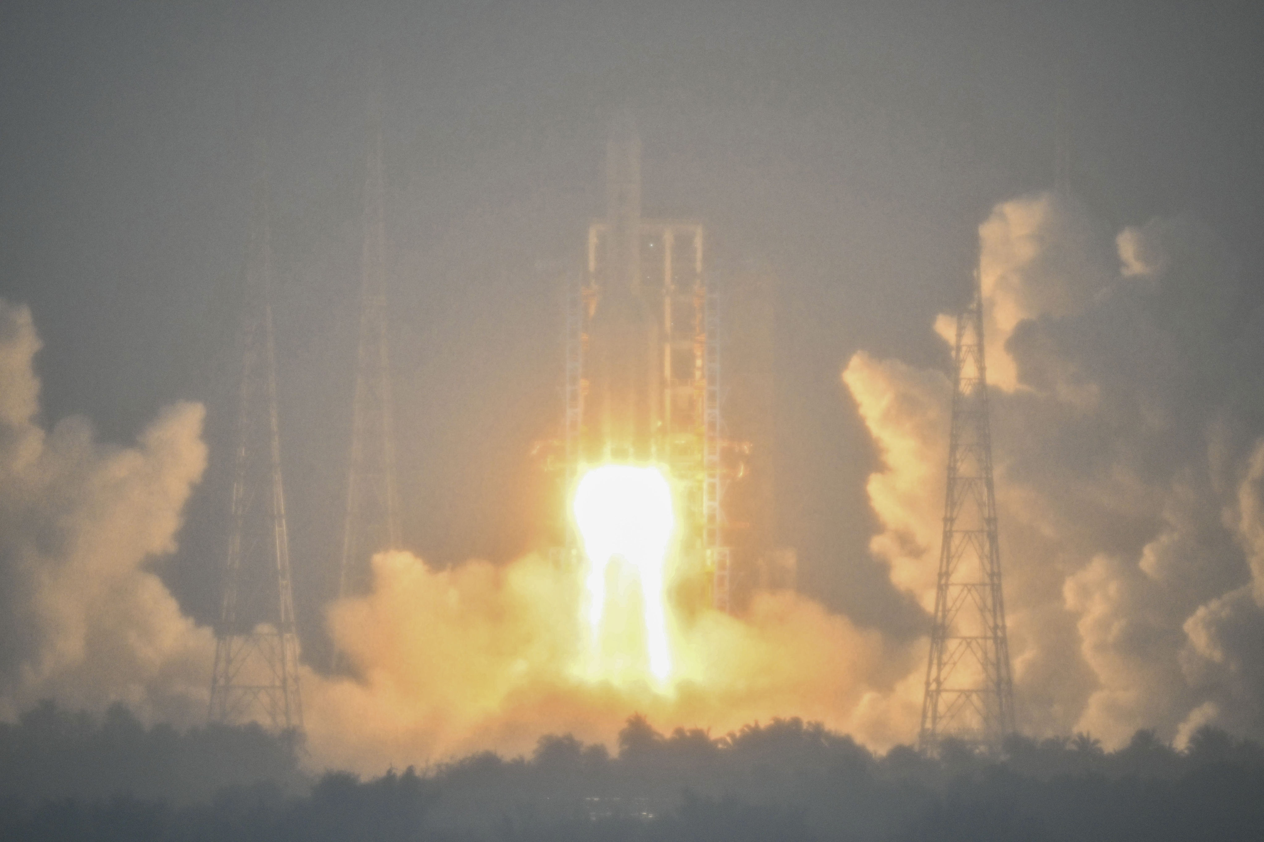 The Chang’e 6 spacecraft lifts off aboard a Long March 5 rocket from the southern island province of Hainan on Friday. Photo: AFP