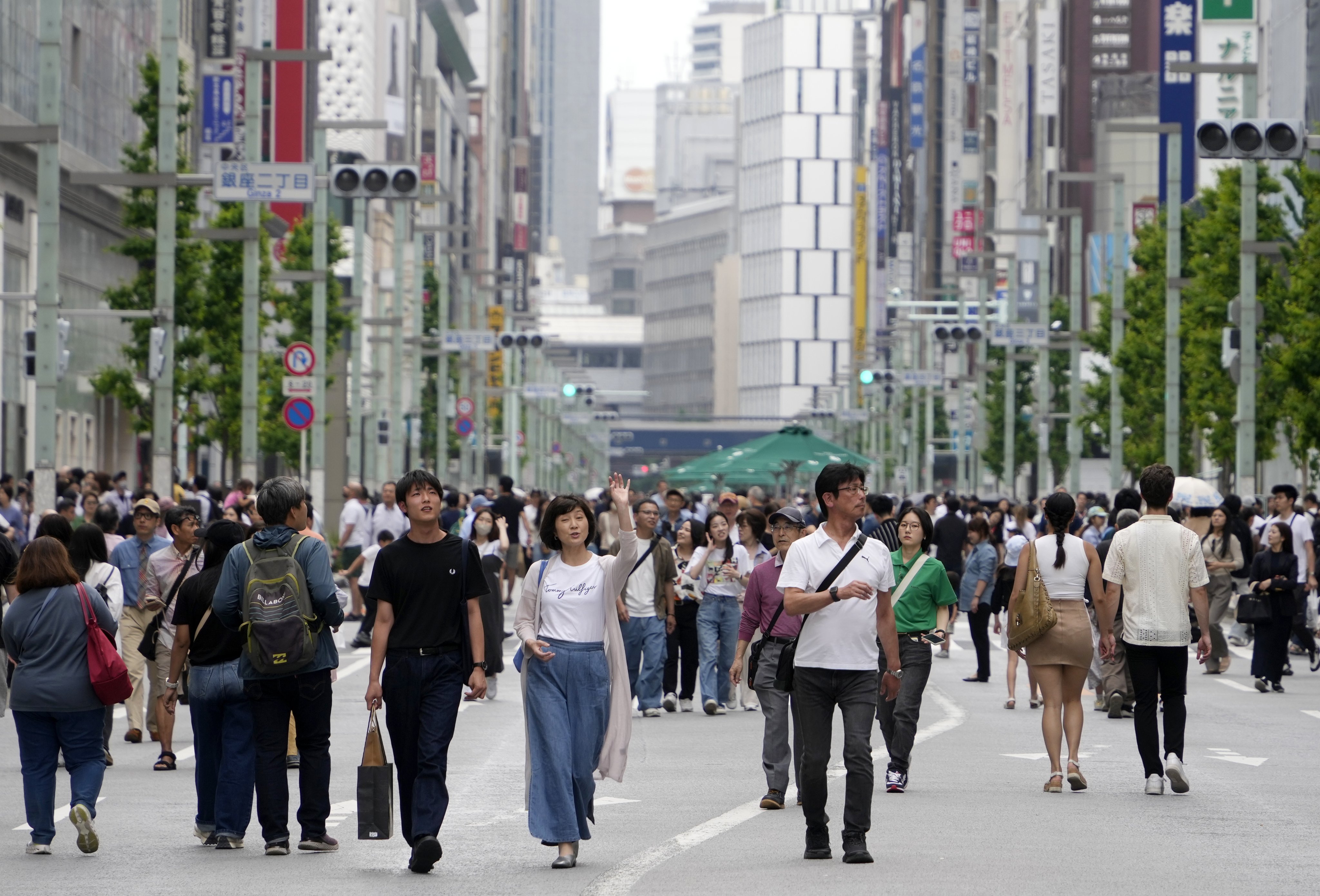 Shoppers walk through the main street of Ginza, Tokyo’s luxury shopping district. Japan’s largely homogenous population does not make the country xenophobic, an analyst says. Photo: EPA-EFE