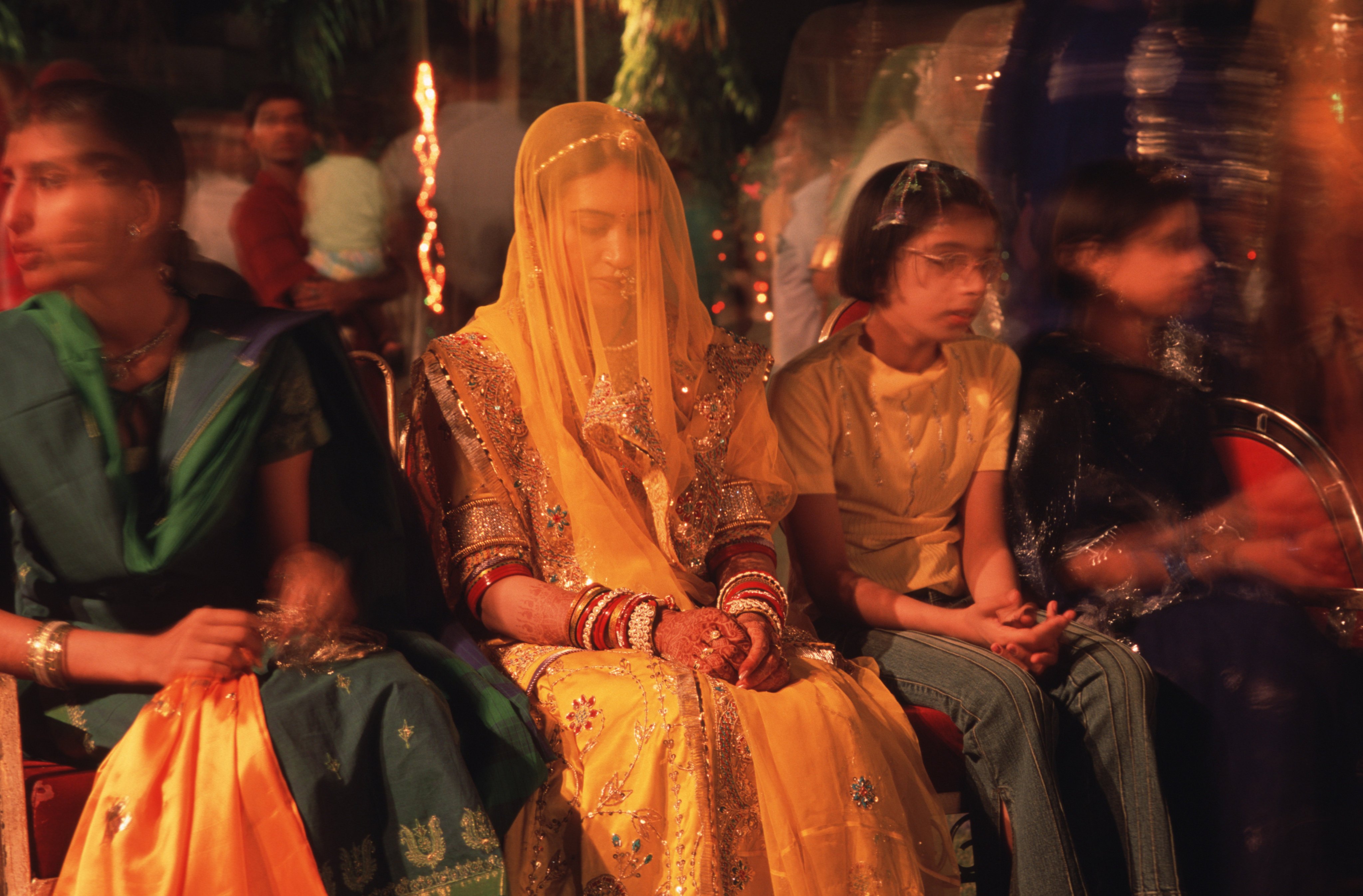 A bride sits during her marriage ceremony in India. Photo: Getty Images