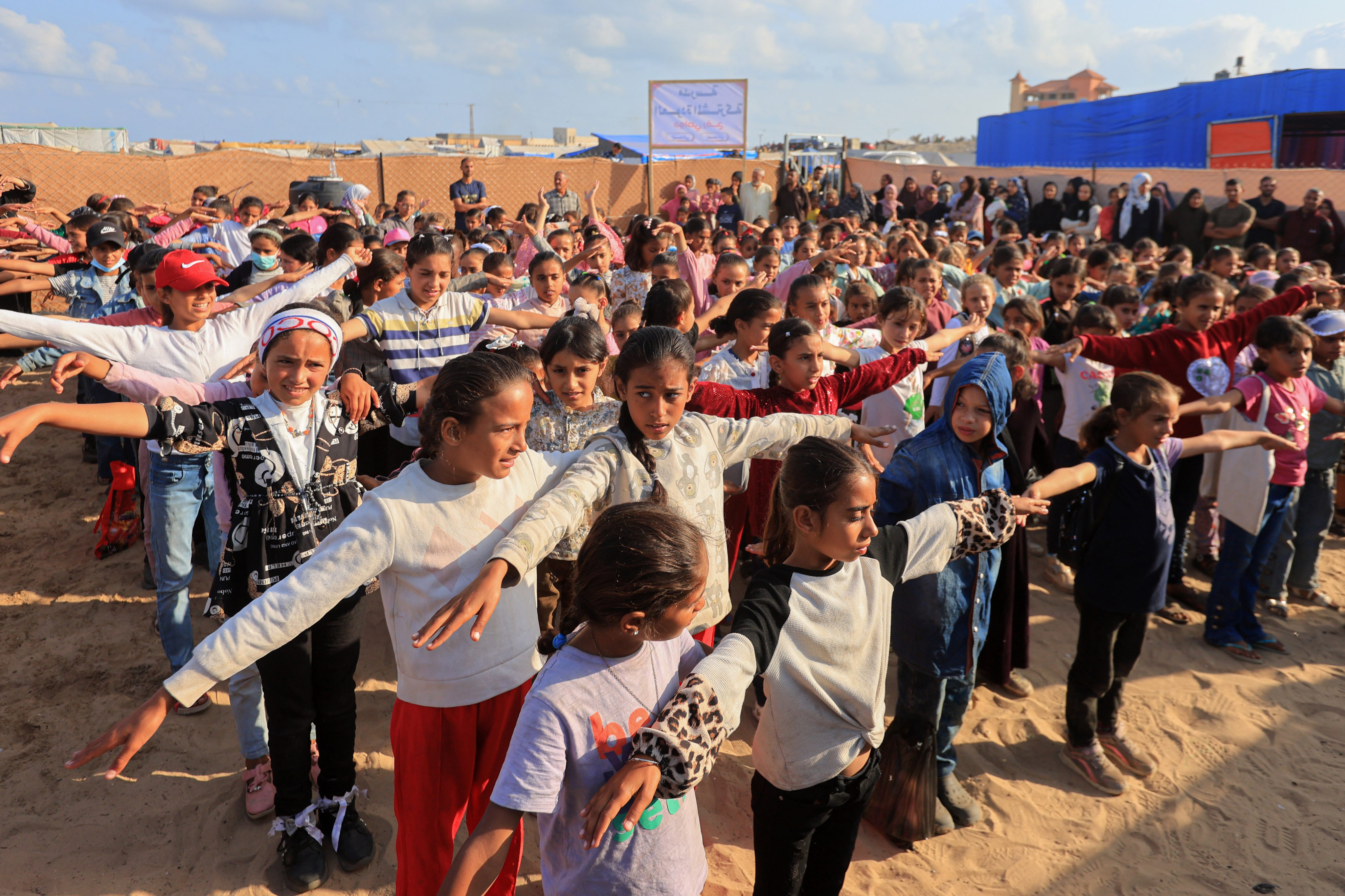 Palestinian students take part in outdoor activities at a makeshift school in the southern Gaza Strip city of Rafah on April 30. Photo: Xinhua