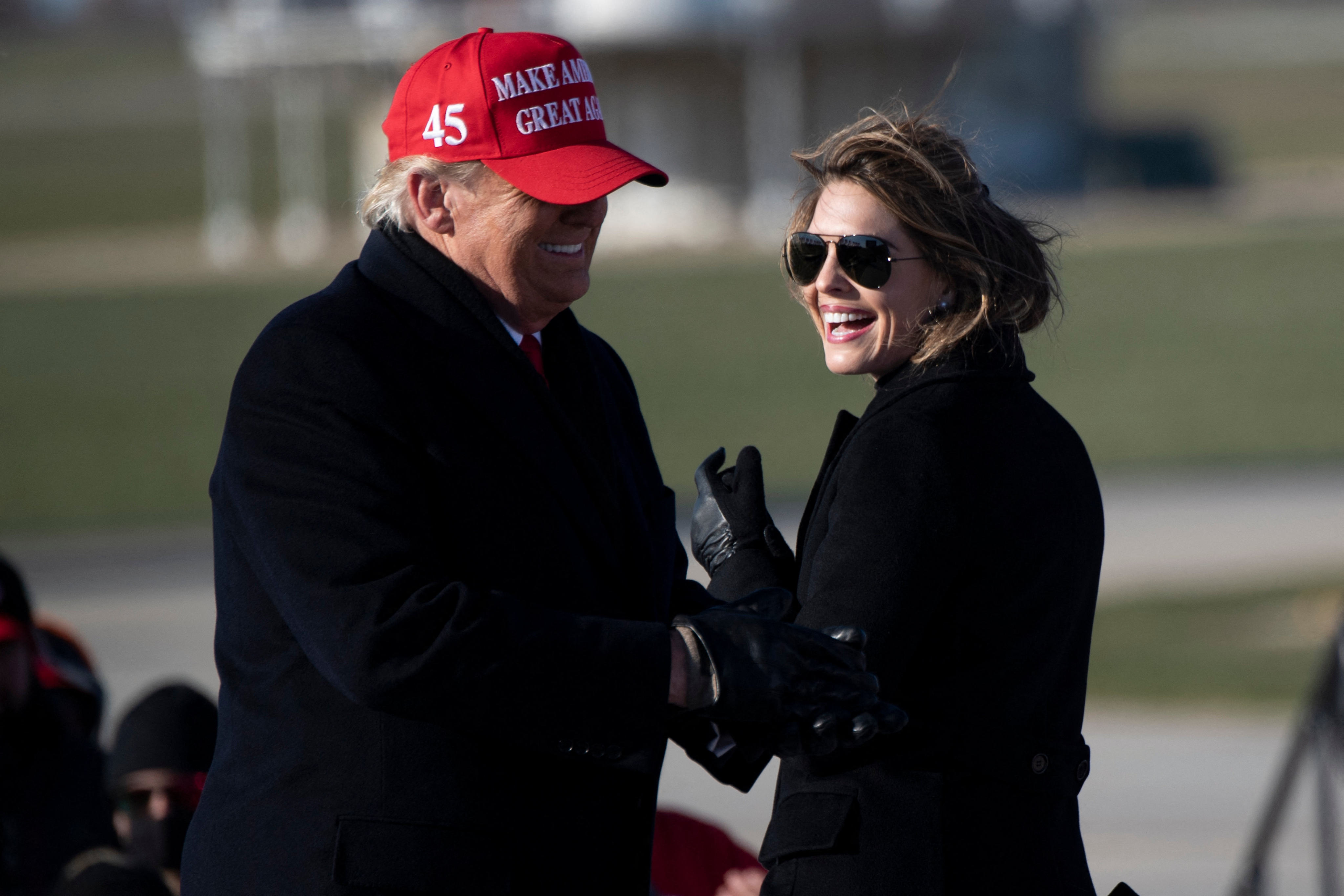 Hope Hicks smiles at US President Donald Trump during a Make America Great Again rally in Dubuque, Iowa, in November 2020. Photo: AFP