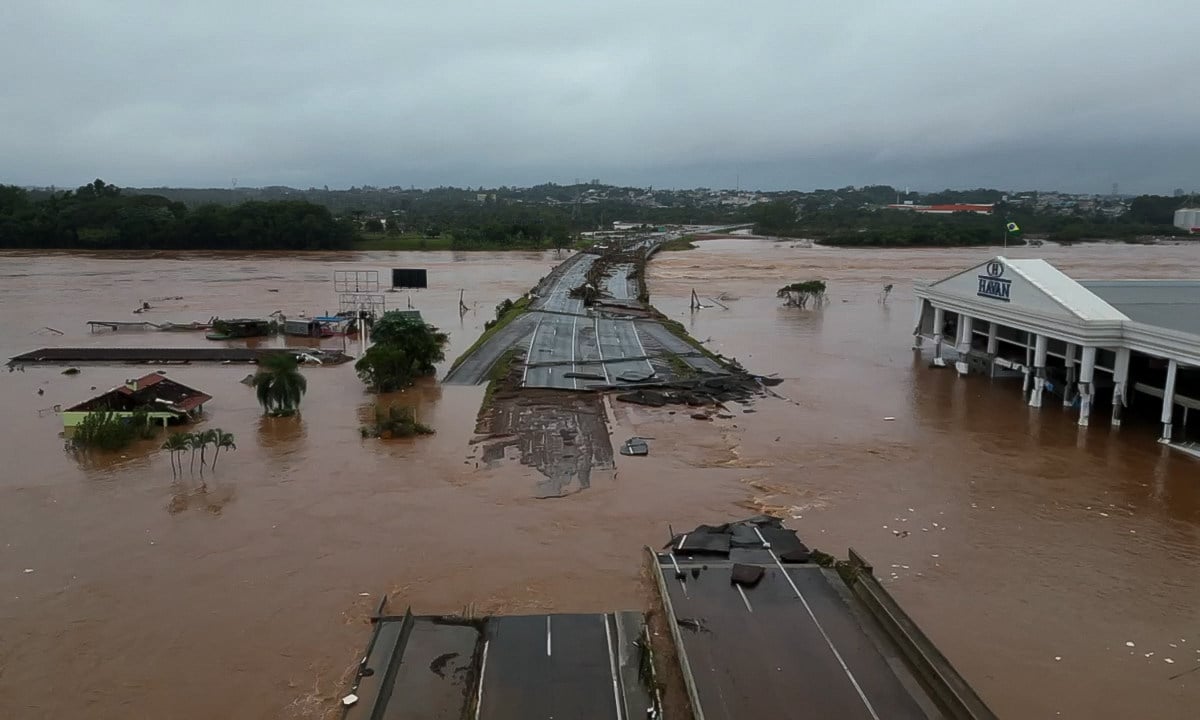 The flooded Taquari river bridge in Brazil’s Rio Grande do Sul state. Authorities have declared a state of emergency, with dozens of people dead and dozens more missing. Photo: Handout via Sao Paulo Civil Defence/AFP