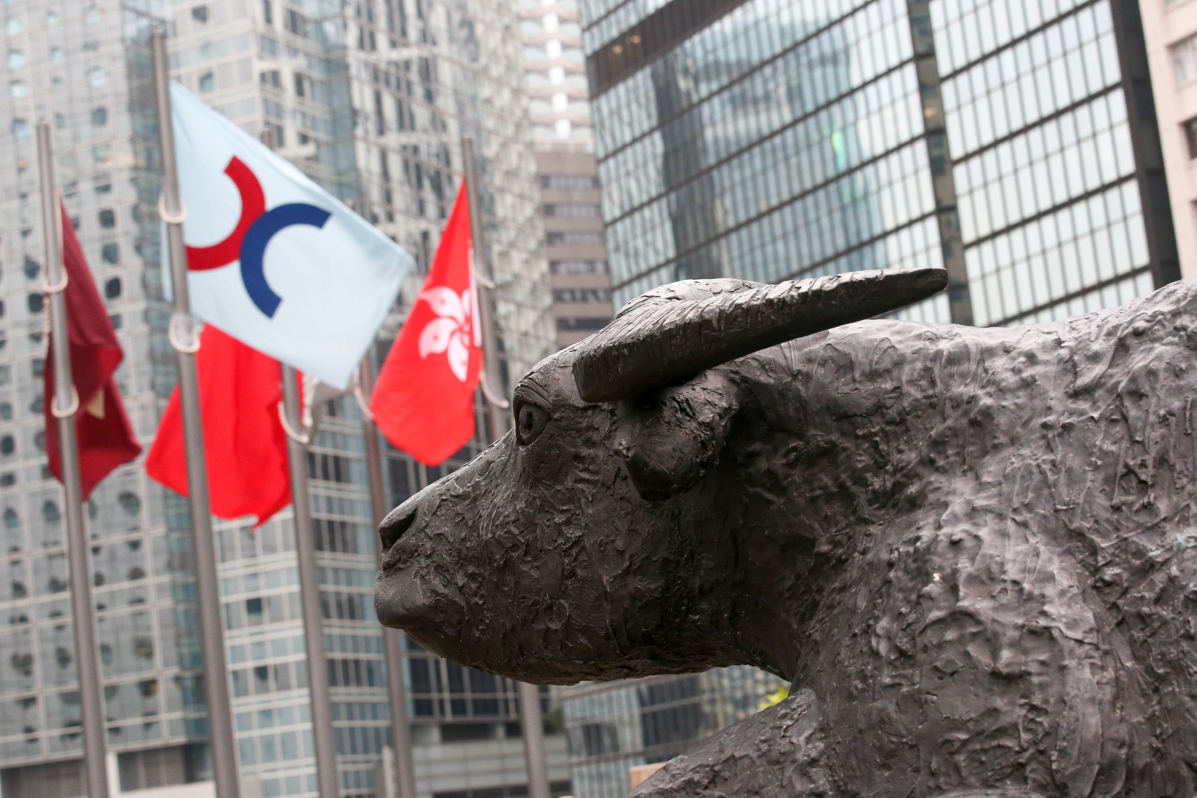 One of two statues of a bull, looking at the Hong Kong Stock Exchange at the Exchange Square in Hong Kong’s Central business district on 9 November 2016. Photo: David Wong